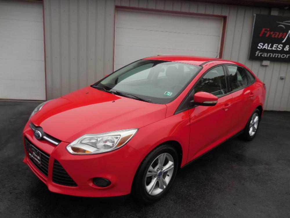 2013 Red /Gray Ford Focus (1FADP3F20DL) with an L4, 2.0L; FFV engine, AT transmission, located at 8464 Route 219, Brockway, PA, 15824, (814) 265-1330, 41.226871, -78.780518 - Photo #0