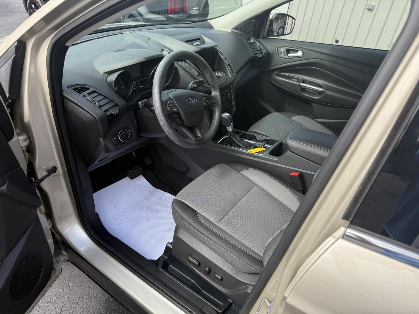 2017 Beige Ford Escape SE 4WD (1FMCU9GD2HU) with an 1.5L L4 DOHC 16V engine, 6A transmission, located at 8464 Route 219, Brockway, PA, 15824, (814) 265-1330, 41.226871, -78.780518 - One sharp pre owned Ford Escape SE 4-wheel drive with air condition, power windows and locks, power seat, pano-roof, factory alloys, and only 53,000 miles. This Ford is serviced, Pa-inspected. Stop in or call one of the Morelli brothers today on this nice suv. - Photo#3