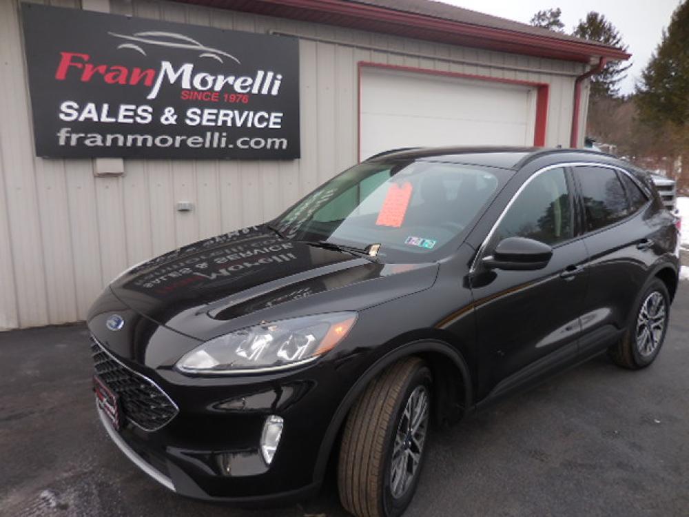 2020 Black /Black Ford Escape SEL AWD (1FMCU9H61LU) with an 1.5L L3 engine, 6A transmission, located at 8464 Route 219, Brockway, PA, 15824, (814) 265-1330, 41.226871, -78.780518 - Must see new body 2020 Ford Escape SEL ALL WHEEL DRIVE with leather interior with power/heated front seats, air condition, power windows and locks, factory alloy wheels, back up camera, and only 16,000 miles. This ford suv is serviced, Pa-Inspected, and comes with plenty of factory warranty. Save th - Photo #0