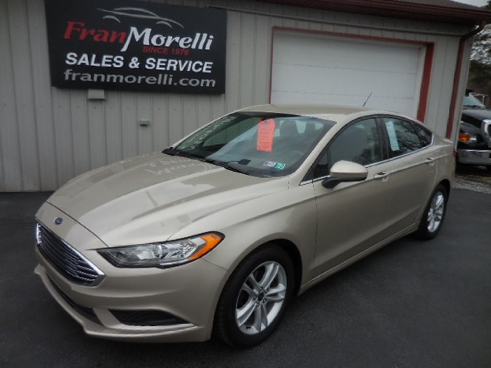 2018 Tan Ford Fusion SE (3FA6P0H78JR) with an 2.5L L4 DOHC 16V engine, 6A transmission, located at 8464 Route 219, Brockway, PA, 15824, (814) 265-1330, 41.226871, -78.780518 - Photo #0