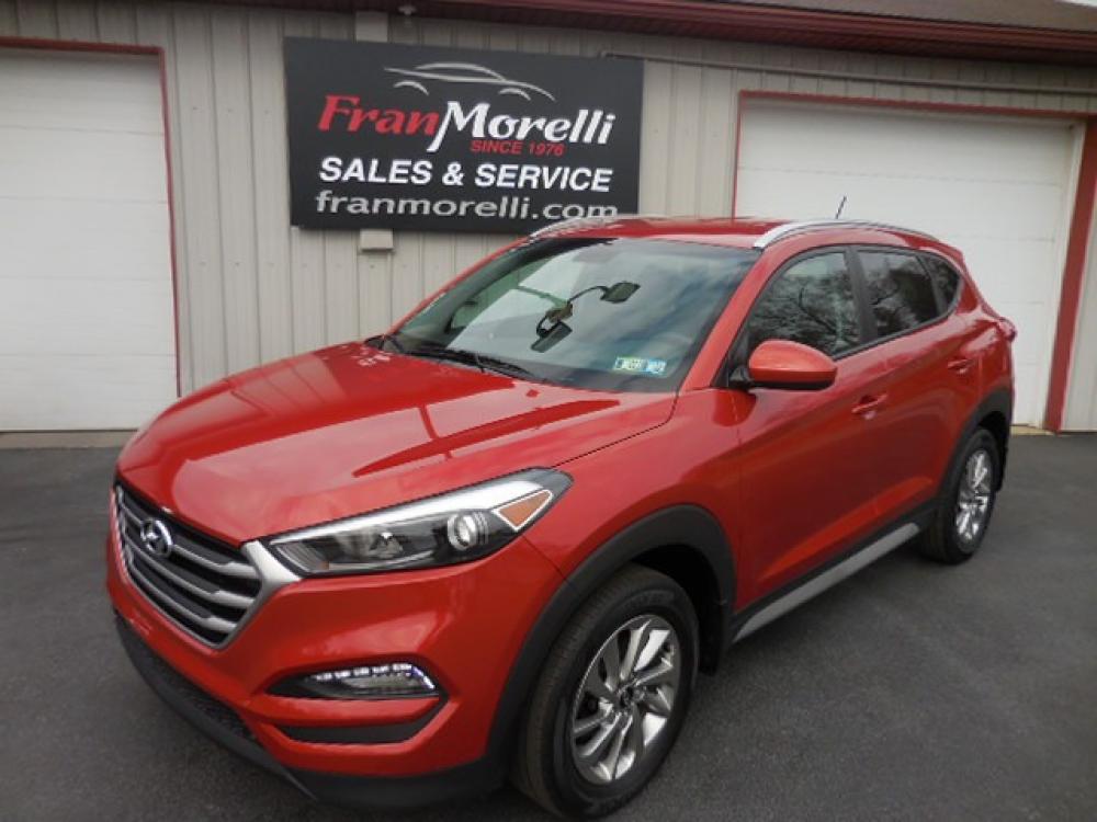 2017 Orange Hyundai Tucson SE w/Preferred Package AWD (KM8J3CA48HU) with an 2.0L L4 DOHC 16V engine, 6A transmission, located at 8464 Route 219, Brockway, PA, 15824, (814) 265-1330, 41.226871, -78.780518 - Photo #0