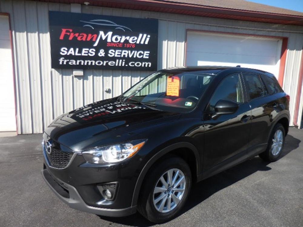 2014 Black Mazda CX-5 Touring (JM3KE2CYXE0) with an 2.5L L4 DOHC 16V engine, 6-Speed Automatic transmission, located at 8464 Route 219, Brockway, PA, 15824, (814) 265-1330, 41.226871, -78.780518 - Clean and Serviced! Stop in and check out this pre owned 2014 Mazda CX-5 Touring with all wheel drive, cloth interior, air condition, power windows and locks, factory sunroof, alloy wheels and much more. - Photo #0