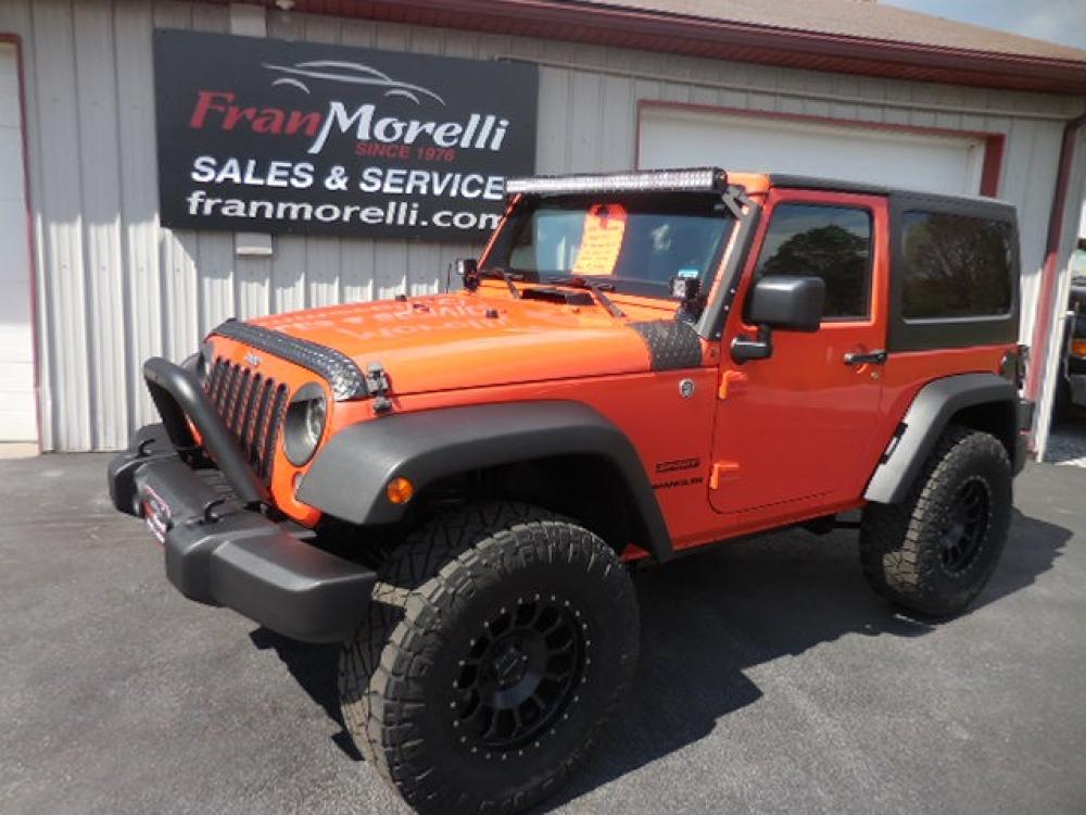 2015 Orange Jeep Wrangler Sport 4WD (1C4AJWAG0FL) with an 3.6L V6 DOHC 24V FFV engine, AUTO transmission, located at 8464 Route 219, Brockway, PA, 15824, (814) 265-1330, 41.226871, -78.780518 - Hurry in this Jeep won't last long..2015 Jeep Wrangler Sport 4wd with V6 engine, automatic transmission, hard-top, air condition, power windows and locks, alloys, serviced, Inspected and ready to go. - Photo #0