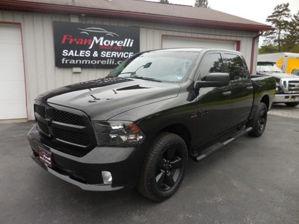2018 Black RAM 1500 Tradesman Crew Cab SWB 4WD (1C6RR7KTXJS) with an 5.7L V8 OHV 16V engine, 8A transmission, located at 8464 Route 219, Brockway, PA, 15824, (814) 265-1330, 41.226871, -78.780518 - Sharp looking pre owned Ram 1500 Crew Cab 4x4 with Hemi motor, air condition, power windows and locks, blacked out 20's, factory hitch, and ONLY 34,000 miles. This truck is serviced, Pa-inspected, and comes with a 12 month/12000 mile warranty. Hurry in trucks don't last long. - Photo #0