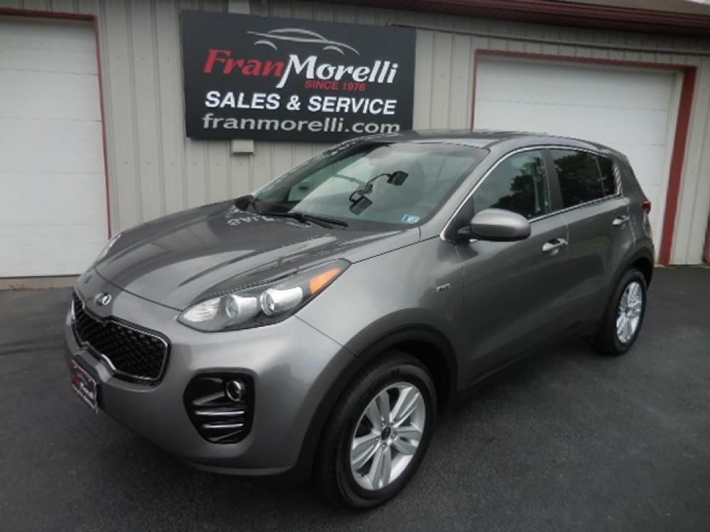 2018 Gray Kia Sportage LX AWD (KNDPMCAC1J7) with an 2.4L V6 DOHC 24V engine, 6A transmission, located at 8464 Route 219, Brockway, PA, 15824, (814) 265-1330, 41.226871, -78.780518 - Photo #0