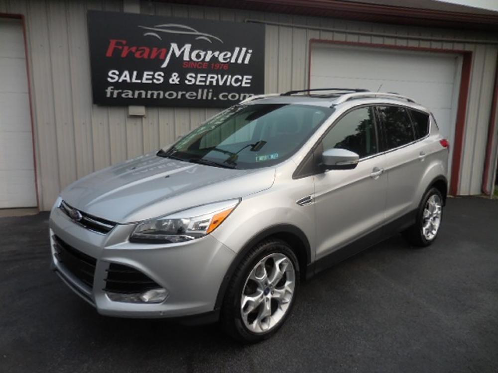 2014 Silver Ford Escape Titanium 4WD (1FMCU9J9XEU) with an 2.0L L4 DOHC 16V engine, 6-Speed Automatic transmission, located at 8464 Route 219, Brockway, PA, 15824, (814) 265-1330, 41.226871, -78.780518 - Photo #0