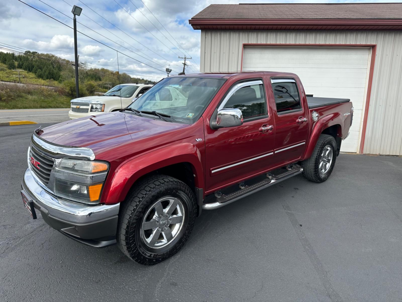 2010 Red GMC Canyon SLE-1 Crew Cab 4WD (1GTJTCDP9A8) with an 5.3L V8 OHV 16V engine, located at 8464 Route 219, Brockway, PA, 15824, (814) 265-1330, 41.226871, -78.780518 - MUST SEE TRUCK...WONT FIND ONE NICER FOR THE AGE!!! Pre owned 2010 GMC Canyon Crew Cab 4wd with V8..yes a V8 engine...air condition, power windows and locks, factory chrome alloys, running boards, bed cover/liner, hitch and much more. This used truck has ONLY 74000 miles. Serviced, Pa-Inspected, and - Photo #0