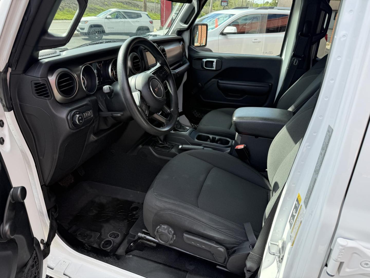 2021 White Jeep Gladiator Sport (1C6HJTAG1ML) with an 3.6L V6 DOHC 24V engine, AUTO transmission, located at 8464 Route 219, Brockway, PA, 15824, (814) 265-1330, 41.226871, -78.780518 - WOW...Don't pass up this next to new 2021 Jeep Gladiator Sport Willys package with 4-wheel drive, automatic, soft top, air condition, blacked out wheels, running boards, factory hitch, and ONLY 63000 miles. This pre owned Jeep is priced to sell. Serviced, Pa-Inspected, and comes with A warranty. Sto - Photo#2