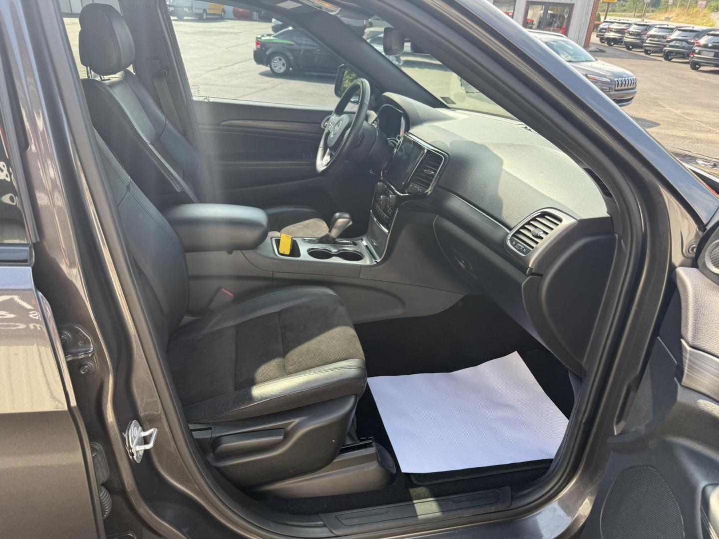 2019 Charcoal Jeep Grand Cherokee Laredo 4WD (1C4RJFAG6KC) with an 3.6L V6 DOHC 24V engine, 8A transmission, located at 8464 Route 219, Brockway, PA, 15824, (814) 265-1330, 41.226871, -78.780518 - ONE SHARP JEEP! Well equipped 2019 Jeep Grand Cherokee Altitude 4wd with leather/cloth seats, front power/heated seats, navigation with big screen radio and back up camera, power sunroof, and ONLY 61000 miles. This Jeep is in excellent shape and is serviced, Pa-Inspected and A warranty. Save thousa - Photo#16