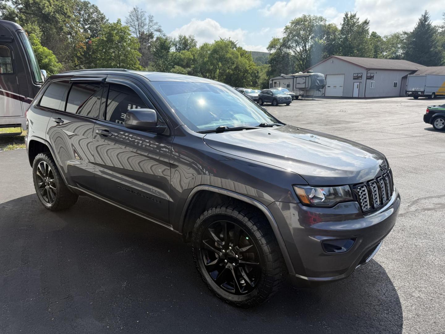 2019 Charcoal Jeep Grand Cherokee Laredo 4WD (1C4RJFAG6KC) with an 3.6L V6 DOHC 24V engine, 8A transmission, located at 8464 Route 219, Brockway, PA, 15824, (814) 265-1330, 41.226871, -78.780518 - ONE SHARP JEEP! Well equipped 2019 Jeep Grand Cherokee Altitude 4wd with leather/cloth seats, front power/heated seats, navigation with big screen radio and back up camera, power sunroof, and ONLY 61000 miles. This Jeep is in excellent shape and is serviced, Pa-Inspected and A warranty. Save thousa - Photo#19