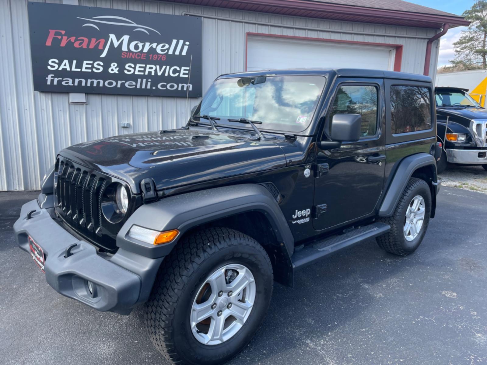 2019 Black Jeep Wrangler Sport 4WD (1C4GJXAG4KW) with an 3.6L V6 DOHC 24V FFV engine, 6sp manual transmission, located at 8464 Route 219, Brockway, PA, 15824, (814) 265-1330, 41.226871, -78.780518 - Local and in great shape. Stop in and see the Morelli boys on this pre owned 2019 Jeep Wrangler Sport 4wd with V6 engine, 6sp manual transmission, air condition, power windows and locks, leather interior, hard top, alloy wheels and ONLY 56000 miles. Serviced, Pa-inspected, and comes with a warranty. - Photo #0