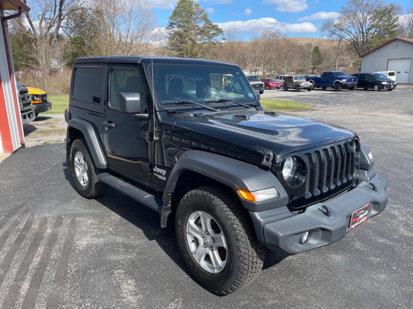 2019 Black Jeep Wrangler Sport 4WD (1C4GJXAG4KW) with an 3.6L V6 DOHC 24V FFV engine, 6sp manual transmission, located at 8464 Route 219, Brockway, PA, 15824, (814) 265-1330, 41.226871, -78.780518 - Local and in great shape. Stop in and see the Morelli boys on this pre owned 2019 Jeep Wrangler Sport 4wd with V6 engine, 6sp manual transmission, air condition, power windows and locks, leather interior, hard top, alloy wheels and ONLY 56000 miles. Serviced, Pa-inspected, and comes with a warranty. - Photo #13