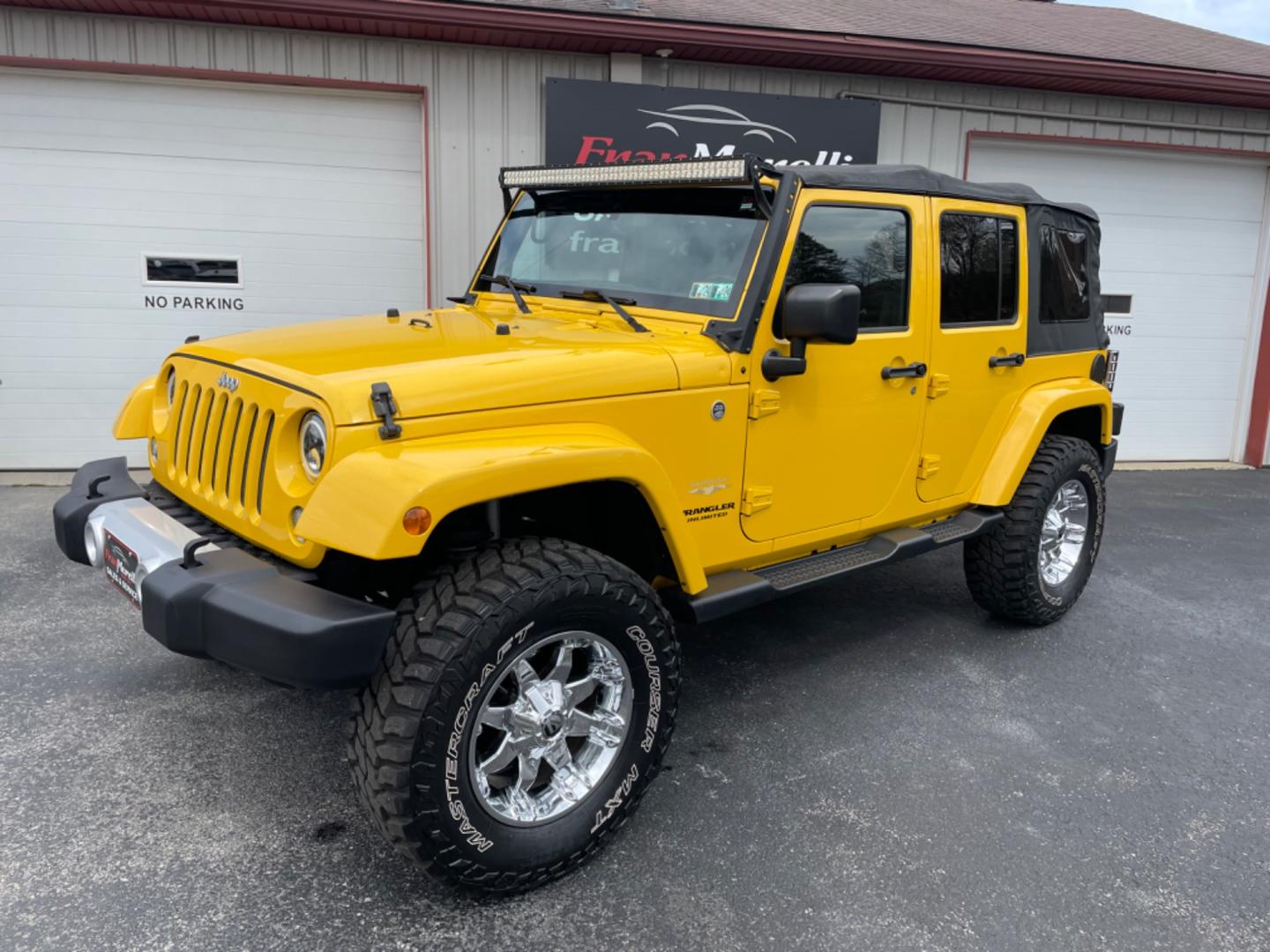 2015 Yellow Jeep Wrangler Unlimited Sahara 4WD (1C4BJWEGXFL) with an 3.6L V6 DOHC 24V FFV engine, 6sp transmission, located at 8464 Route 219, Brockway, PA, 15824, (814) 265-1330, 41.226871, -78.780518 - MUST SEE 2015 JEEP WRANGLER UNLIMITED SAHARA 4WD WITH LIFT AND CHROME WHEELS. This pre owned Jeep has ONLY 47000 miles and comes with a soft top, air condition, 6sp manual transmission, power windows and locks, and much more. Serviced and Pa-inspected. - Photo#0