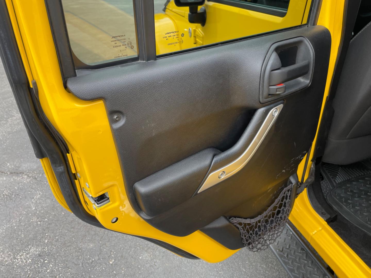 2015 Yellow Jeep Wrangler Unlimited Sahara 4WD (1C4BJWEGXFL) with an 3.6L V6 DOHC 24V FFV engine, 6sp transmission, located at 8464 Route 219, Brockway, PA, 15824, (814) 265-1330, 41.226871, -78.780518 - MUST SEE 2015 JEEP WRANGLER UNLIMITED SAHARA 4WD WITH LIFT AND CHROME WHEELS. This pre owned Jeep has ONLY 47000 miles and comes with a soft top, air condition, 6sp manual transmission, power windows and locks, and much more. Serviced and Pa-inspected. - Photo#11