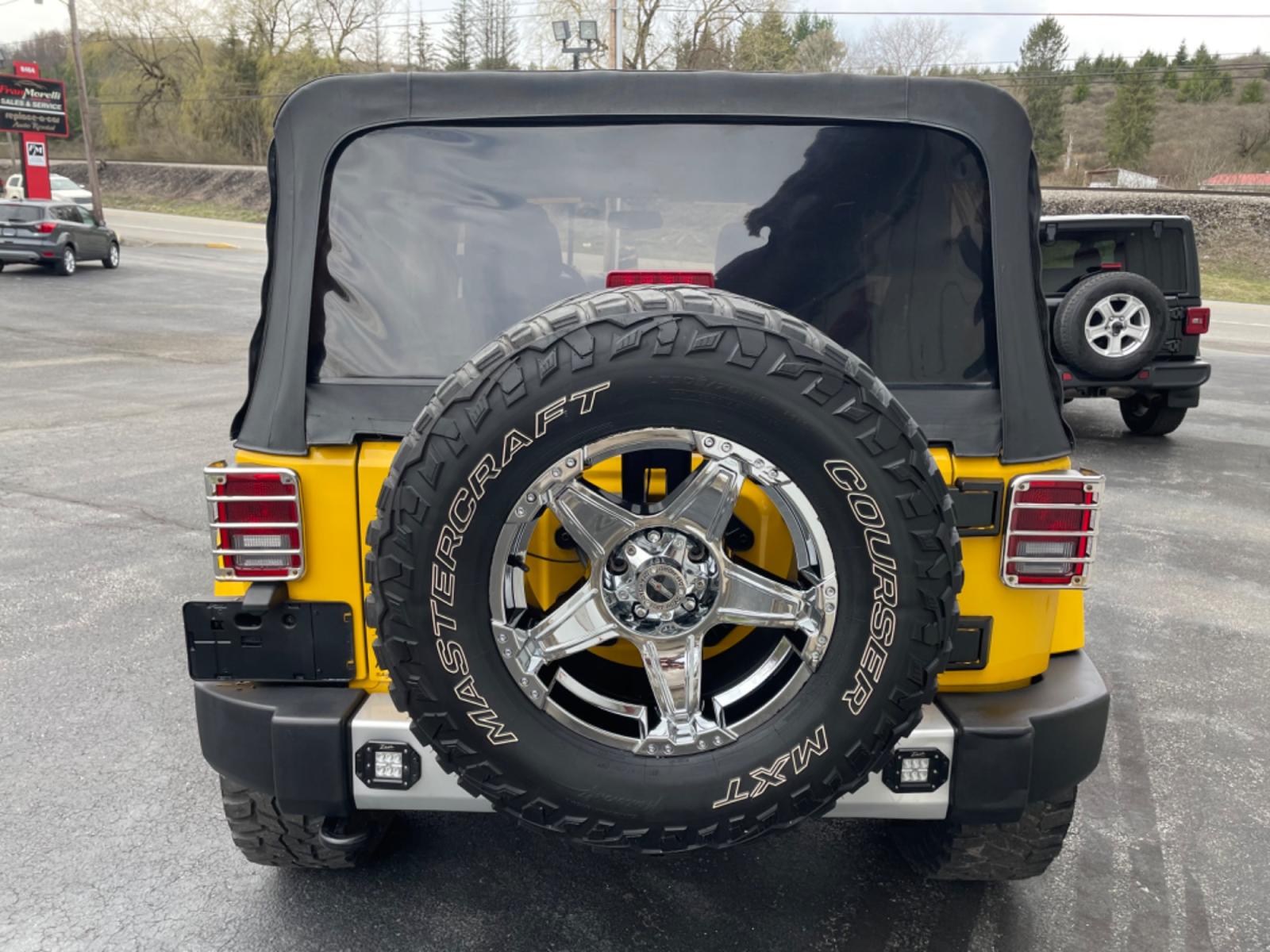 2015 Yellow Jeep Wrangler Unlimited Sahara 4WD (1C4BJWEGXFL) with an 3.6L V6 DOHC 24V FFV engine, 6sp transmission, located at 8464 Route 219, Brockway, PA, 15824, (814) 265-1330, 41.226871, -78.780518 - MUST SEE 2015 JEEP WRANGLER UNLIMITED SAHARA 4WD WITH LIFT AND CHROME WHEELS. This pre owned Jeep has ONLY 47000 miles and comes with a soft top, air condition, 6sp manual transmission, power windows and locks, and much more. Serviced and Pa-inspected. - Photo #13