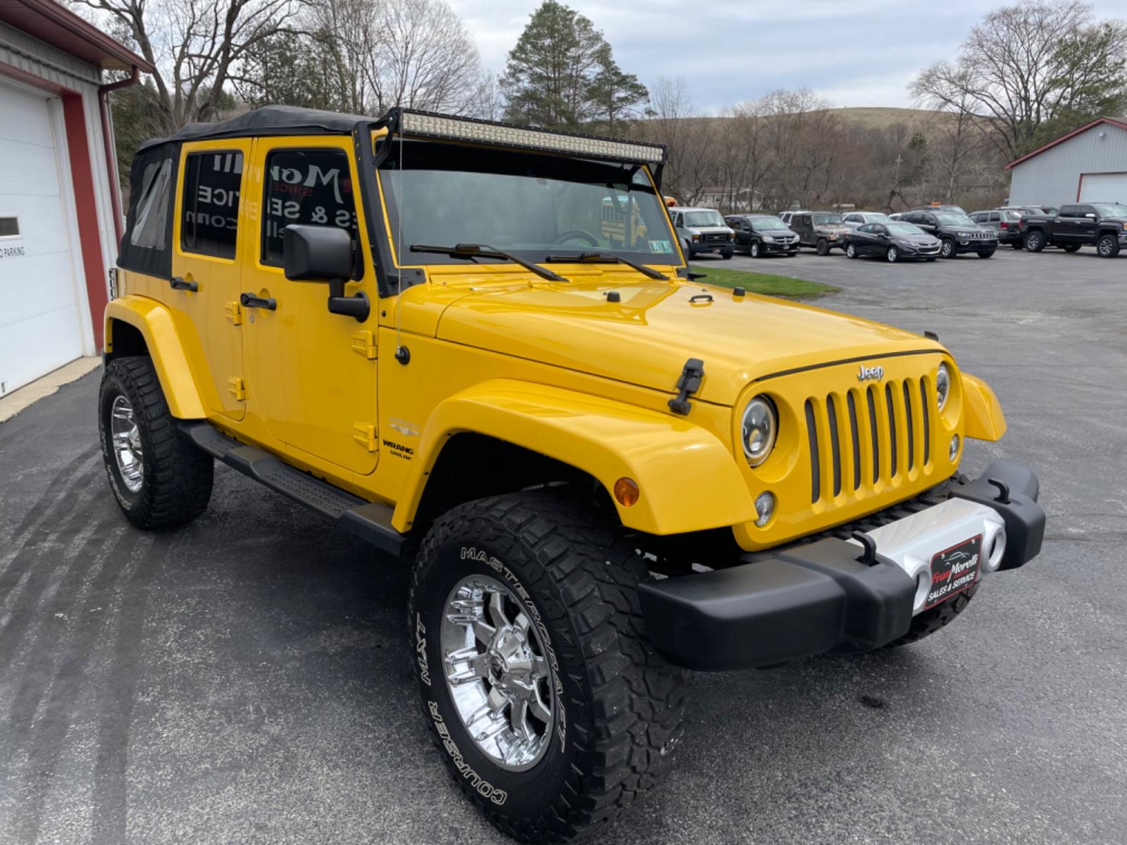 2015 Yellow Jeep Wrangler Unlimited Sahara 4WD (1C4BJWEGXFL) with an 3.6L V6 DOHC 24V FFV engine, 6sp transmission, located at 8464 Route 219, Brockway, PA, 15824, (814) 265-1330, 41.226871, -78.780518 - Photo #20