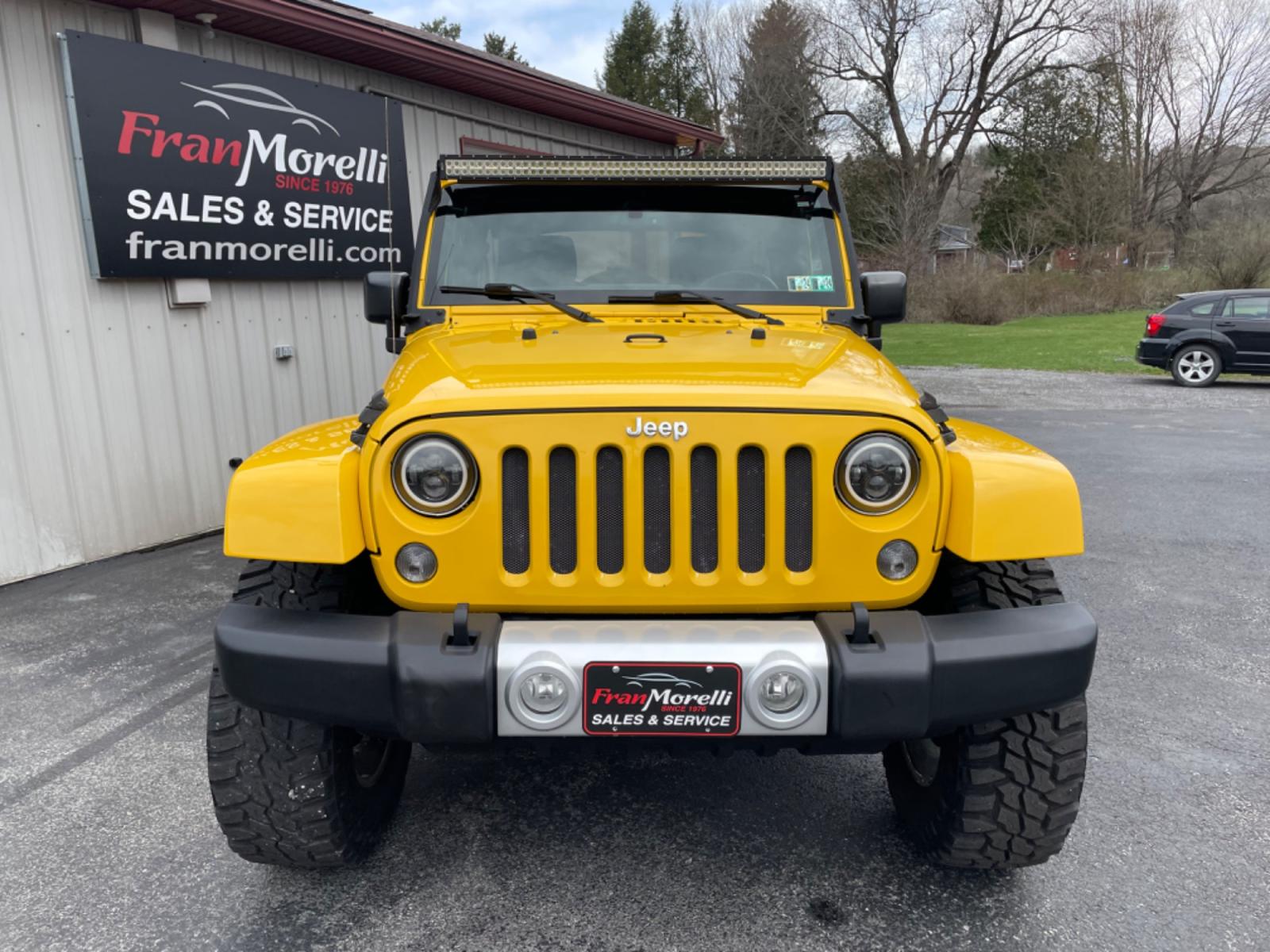 2015 Yellow Jeep Wrangler Unlimited Sahara 4WD (1C4BJWEGXFL) with an 3.6L V6 DOHC 24V FFV engine, 6sp transmission, located at 8464 Route 219, Brockway, PA, 15824, (814) 265-1330, 41.226871, -78.780518 - Photo #21