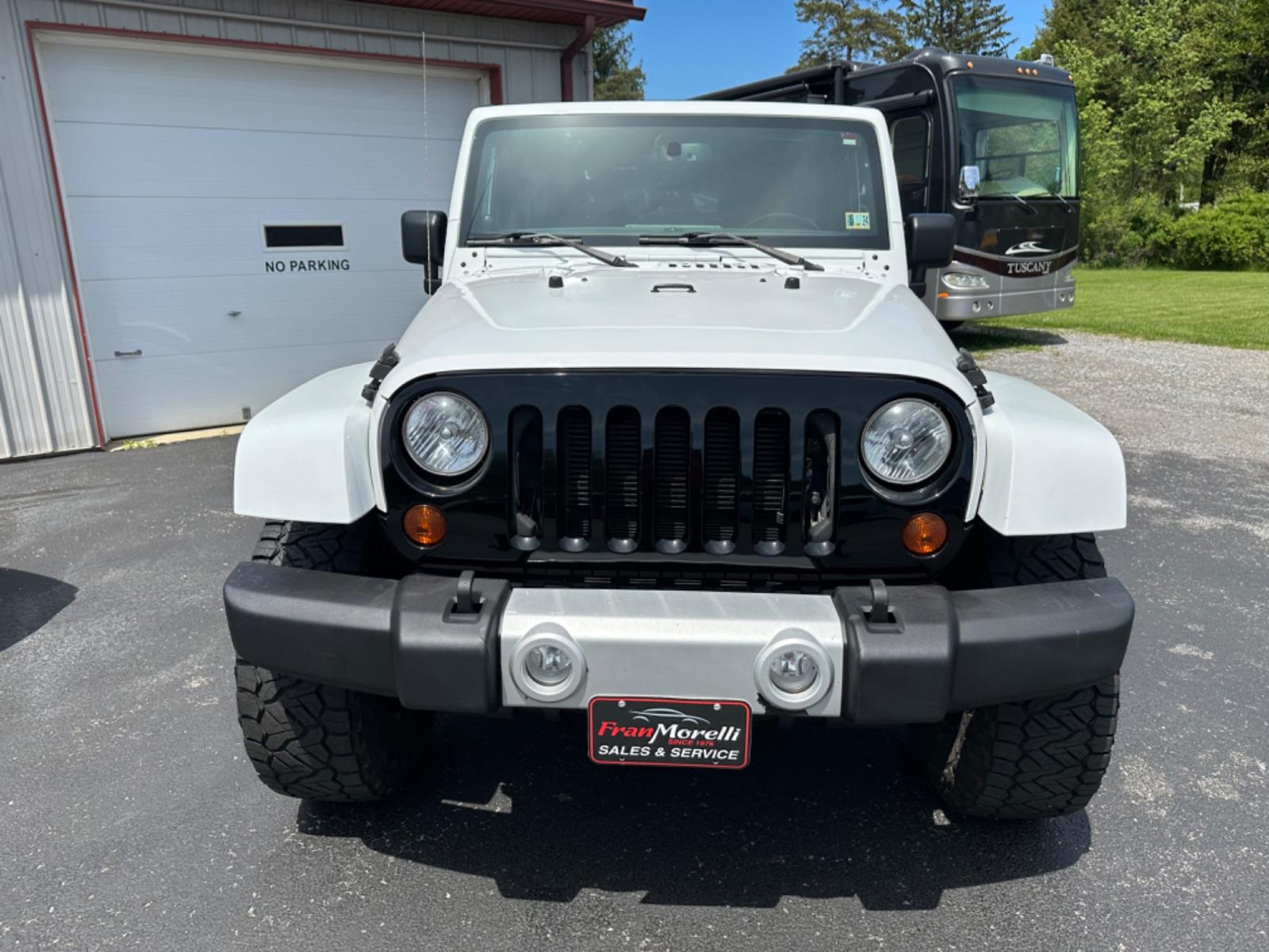 2013 White Jeep Wrangler Unlimited Sahara 4WD (1C4BJWEG2DL) with an 3.6L V6 DOHC 24V FFV engine, located at 8464 Route 219, Brockway, PA, 15824, (814) 265-1330, 41.226871, -78.780518 - Photo #20