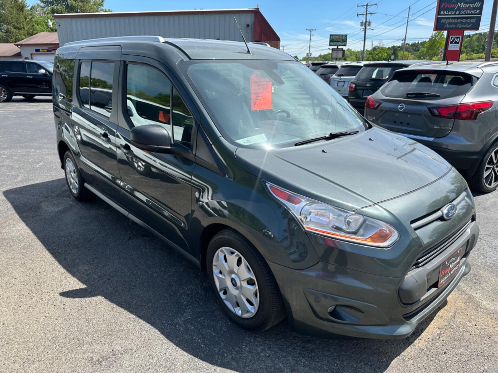 2017 Green Ford Transit Connect Wagon XLT w/Rear Liftgate LWB (NM0GE9F75H1) with an 2.5L L4 DOHC 16V engine, 6A transmission, located at 8464 Route 219, Brockway, PA, 15824, (814) 265-1330, 41.226871, -78.780518 - HARD TO FIND VEHICLE AND WE HAVE THE RIGHT ONE! Stop in and check out this pre owned 2017 Ford Transit Connect XLT long wheel base. Serviced, comes equipped with 5 passenger, air condition, power seat, rear a/c factory alloys and much more. - Photo #17