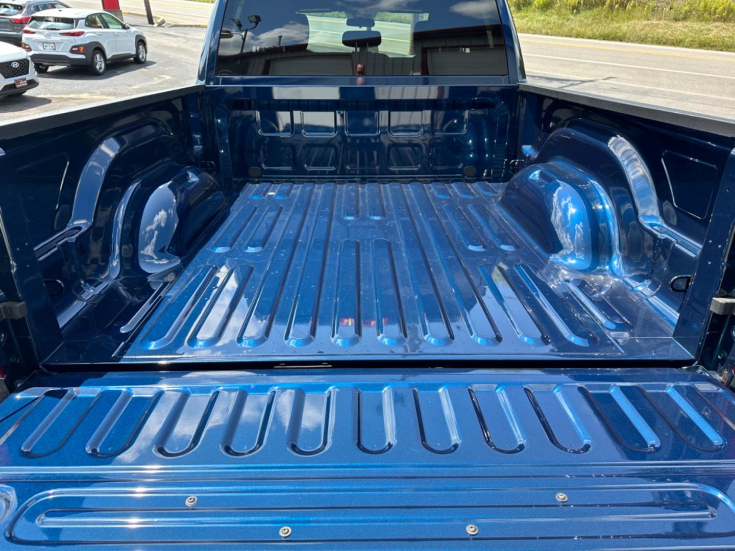 2022 Blue RAM 1500 SLT Quad Cab 4WD (1C6RR7GG3NS) with an 3.6L V6 DOHC 24V FFV engine, 8A transmission, located at 8464 Route 219, Brockway, PA, 15824, (814) 265-1330, 41.226871, -78.780518 - Local 1-owner with ONLY 1200 miles. Warlock package with 3.6/V6, air condition, power windows and locks, factory alloys, hitch, and next to new. Lots of factory remaining warranty. - Photo#12