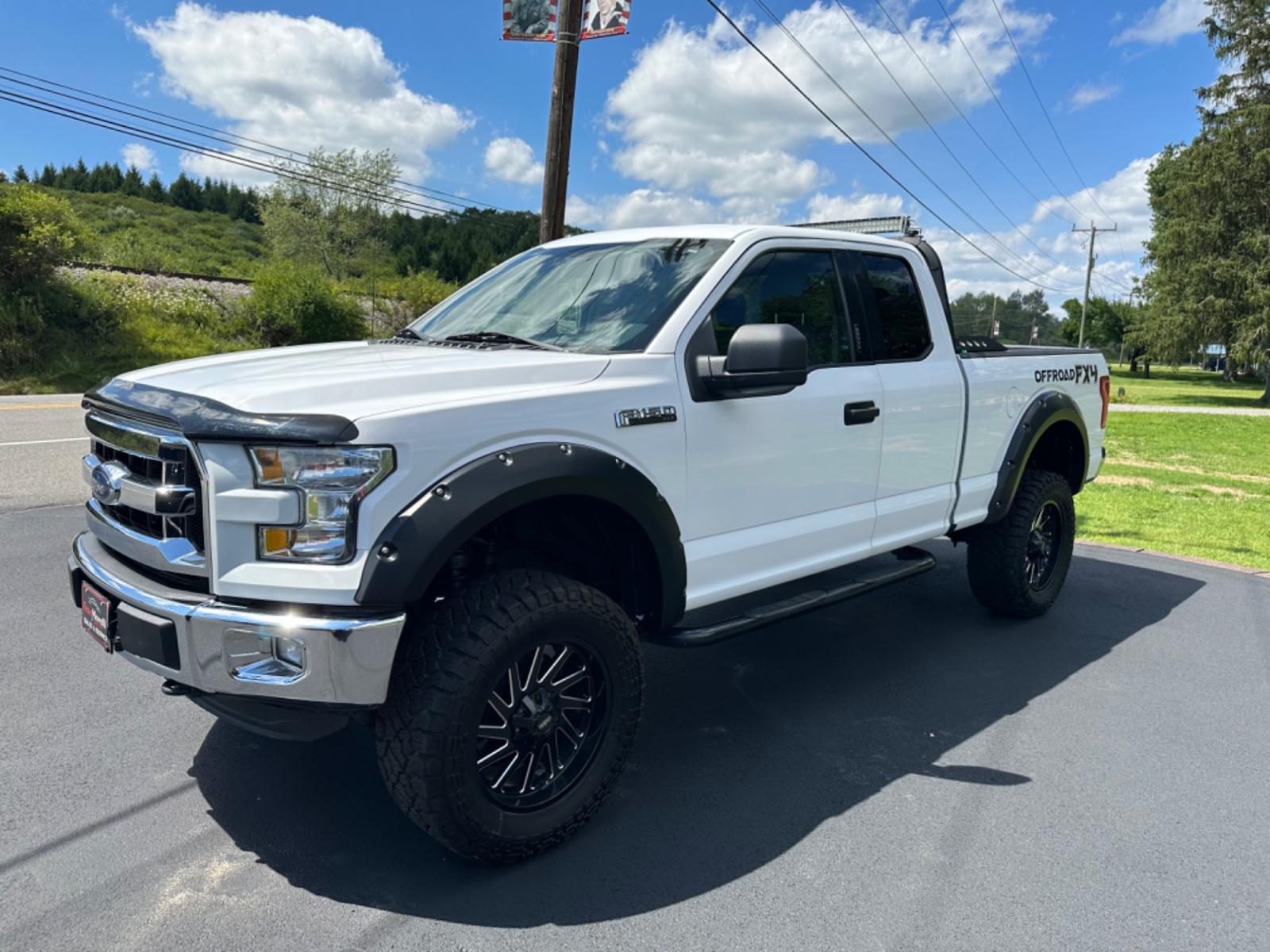 2015 White Ford F-150 Lariat SuperCab 6.5-ft. Bed 4WD (1FTEX1E82FK) with an 3.5L V6 DOHC 24V engine, 6-Speed Automatic transmission, located at 8464 Route 219, Brockway, PA, 15824, (814) 265-1330, 41.226871, -78.780518 - MUST SEE TRUCK...2015 Ford F150 Extended Cab XLT 4wd with air Condition, power windows and locks, lift kit, bed liner, and much more...no rust. Serviced and ready to go. - Photo #0