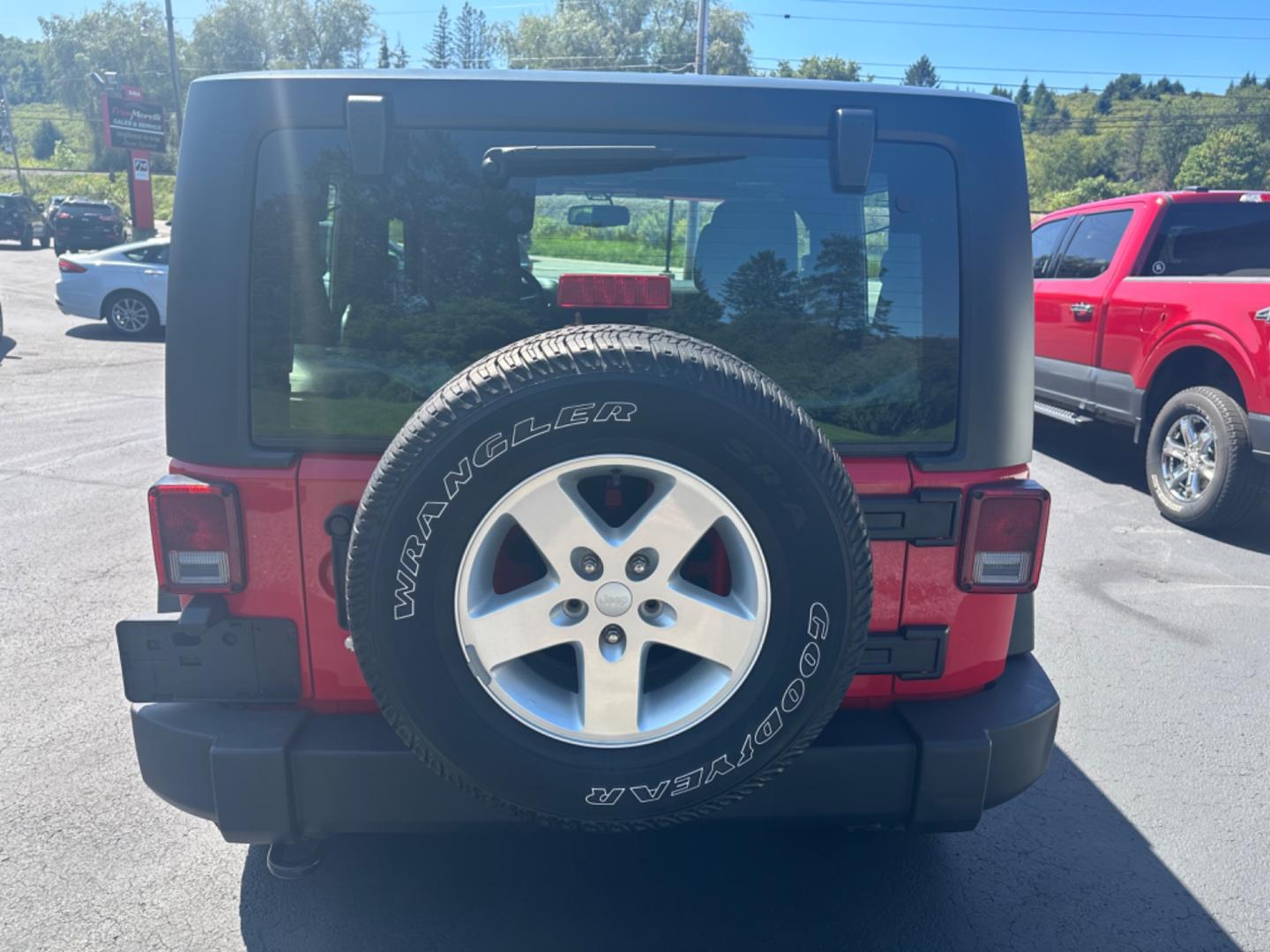 2015 Red Jeep Wrangler Sport 4WD (1C4AJWAG3FL) with an 3.6L V6 DOHC 24V FFV engine, located at 8464 Route 219, Brockway, PA, 15824, (814) 265-1330, 41.226871, -78.780518 - Super clean 2015 Jeep Wrangler Sport 4wd 2door with hard top, V6, automatic, air condition, power windows and locks, and alloys. This Jeep is serviced and ready to go. - Photo#10