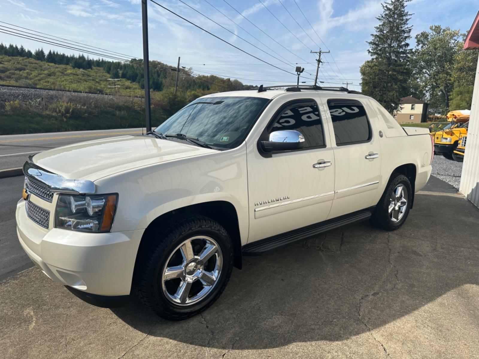 2013 White Chevrolet Avalanche LTZ 4WD (3GNTKGE72DG) with an 5.3L V8 OHV 16V FFV engine, 4-Speed Automatic transmission, located at 8464 Route 219, Brockway, PA, 15824, (814) 265-1330, 41.226871, -78.780518 - MUST SEE TRUCK...Locally traded in and excellent shape! 2013 Chev Avalanche LTZ 4wd with every option they put in them. Sunroof, chrome alloys, power/heated seats, navigation, and ONLY 68000 miles. Serviced and ready to go. Hard to find and we have the right one. Hurry in and see the Morelli boys to - Photo #0