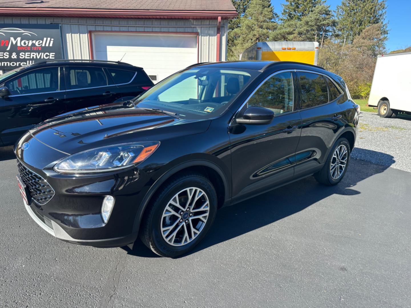 2020 Black Ford Escape SEL AWD (1FMCU9H69LU) with an 1.5L L3 engine, 6A transmission, located at 8464 Route 219, Brockway, PA, 15824, (814) 265-1330, 41.226871, -78.780518 - Good looking pre owned 2020 Ford Escape SEL 4wd with leather interior, power/heated front seats, air condition, power windows and locks, factory alloys, big screen radio with back up camera and ONLY 37000 miles. Serviced and comes with remaining factory warranty. - Photo#0