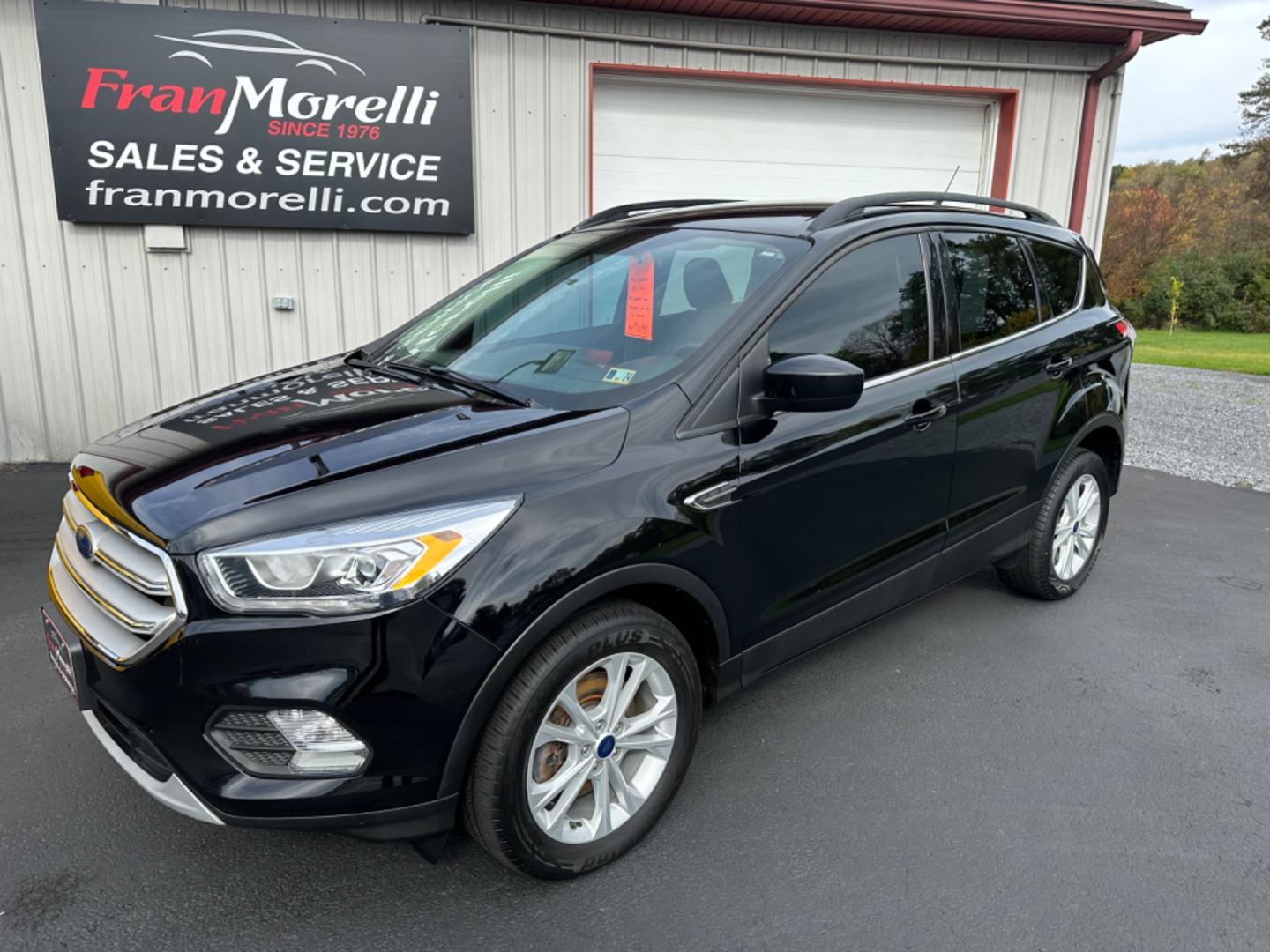 2018 Black Ford Escape SEL 4WD (1FMCU9HD6JU) with an 1.5L L4 DOHC 16V engine, 6A transmission, located at 8464 Route 219, Brockway, PA, 15824, (814) 265-1330, 41.226871, -78.780518 - Photo#0