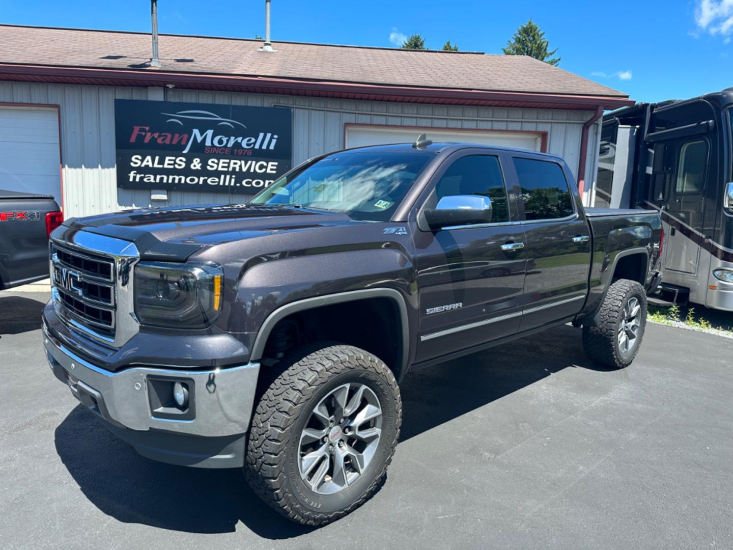 2015 Gray GMC Sierra 1500 (3GTU2VEC7FG) with an 8 engine, automatic transmission, located at 8464 Route 219, Brockway, PA, 15824, (814) 265-1330, 41.226871, -78.780518 - Sharp looking 2015 GMC Sierra 1500 Crew Cab SLT well equipped and comes with lots of extras. Clean, serviced and ready to go. This GMC truck has leather interior with power/heated front seats, 5" Rough Country Suspension lift, 35" tires, LED headlights, dual exhausts, Tonneau cover with bed mat, tin - Photo#0