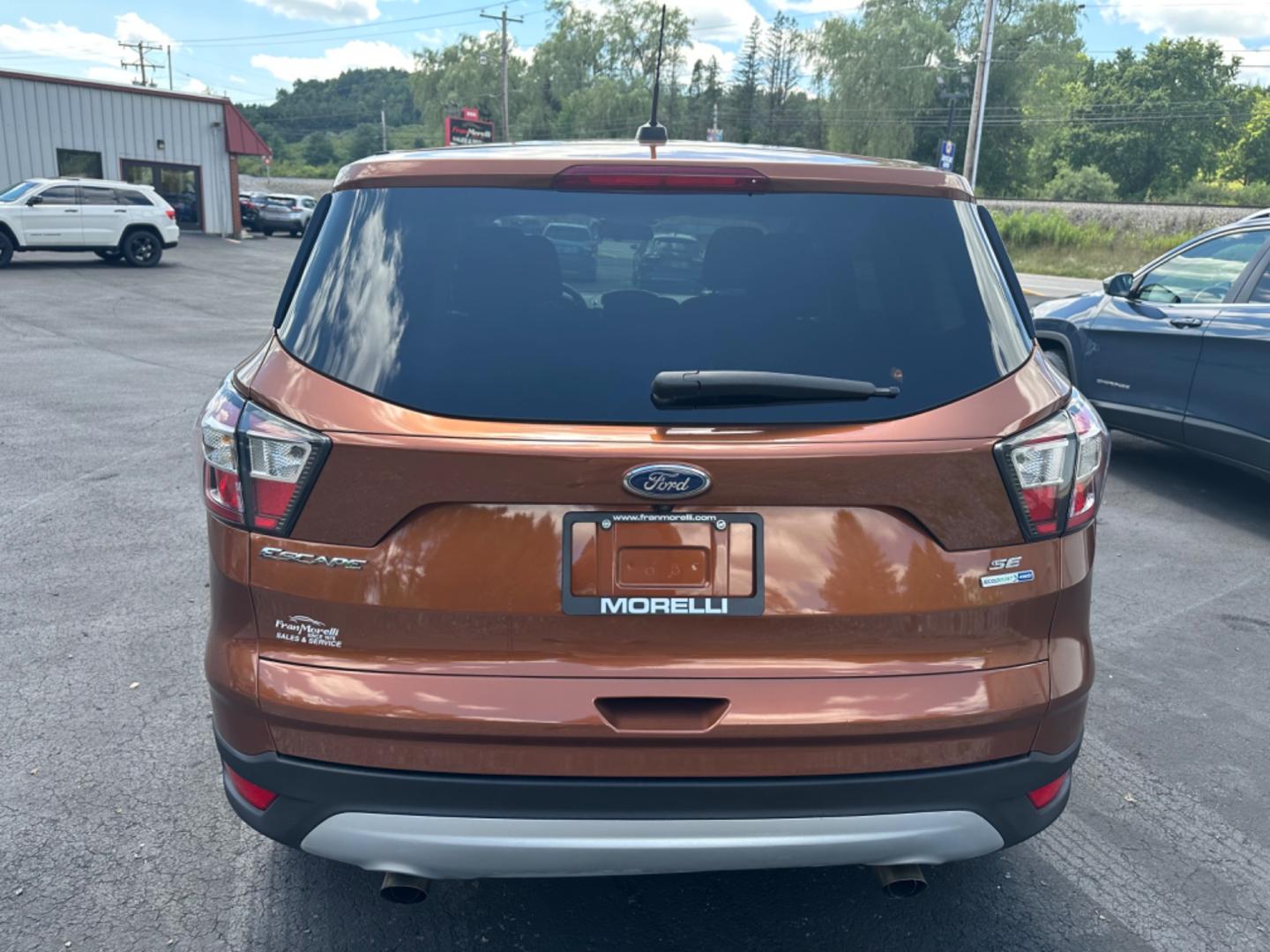 2017 DK RED Ford Escape (1FMCU9GD8HU) with an 4 engine, automatic transmission, located at 8464 Route 219, Brockway, PA, 15824, (814) 265-1330, 41.226871, -78.780518 - Photo#9