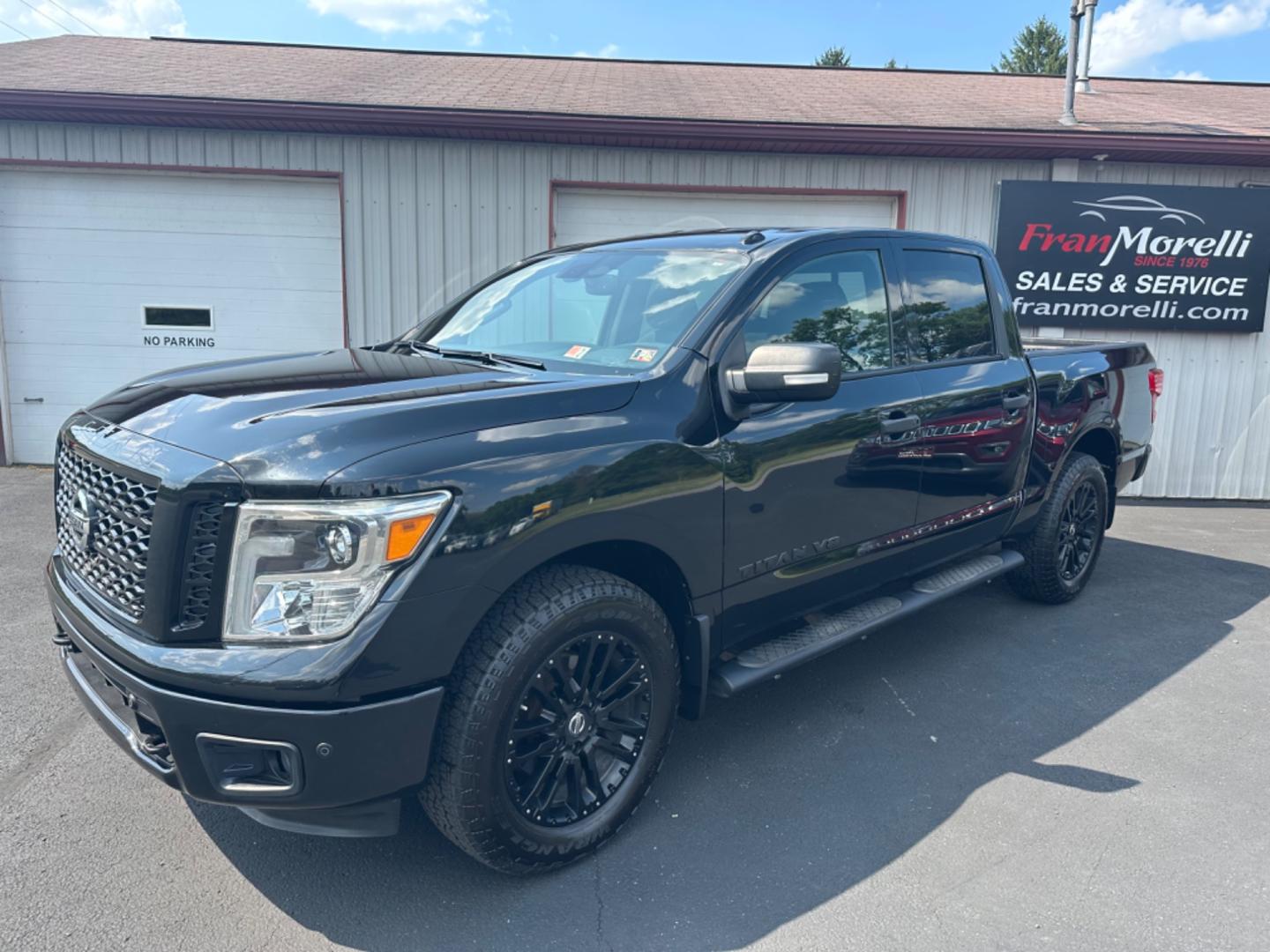 2018 Black Nissan Titan (1N6AA1E53JN) with an 8 engine, automatic transmission, located at 8464 Route 219, Brockway, PA, 15824, (814) 265-1330, 41.226871, -78.780518 - ONE SHARP TRUCK...THIS 2018 Nissan Titan SV crew cab 4wd truck is very well taken care of and well equipped. Midnight edition with blacked out wheels, V8 engine, air condition, pwr seat, running boards, factory hitch and much more. This truck is serviced and under coated. Very nice pre owned truck!! - Photo#0