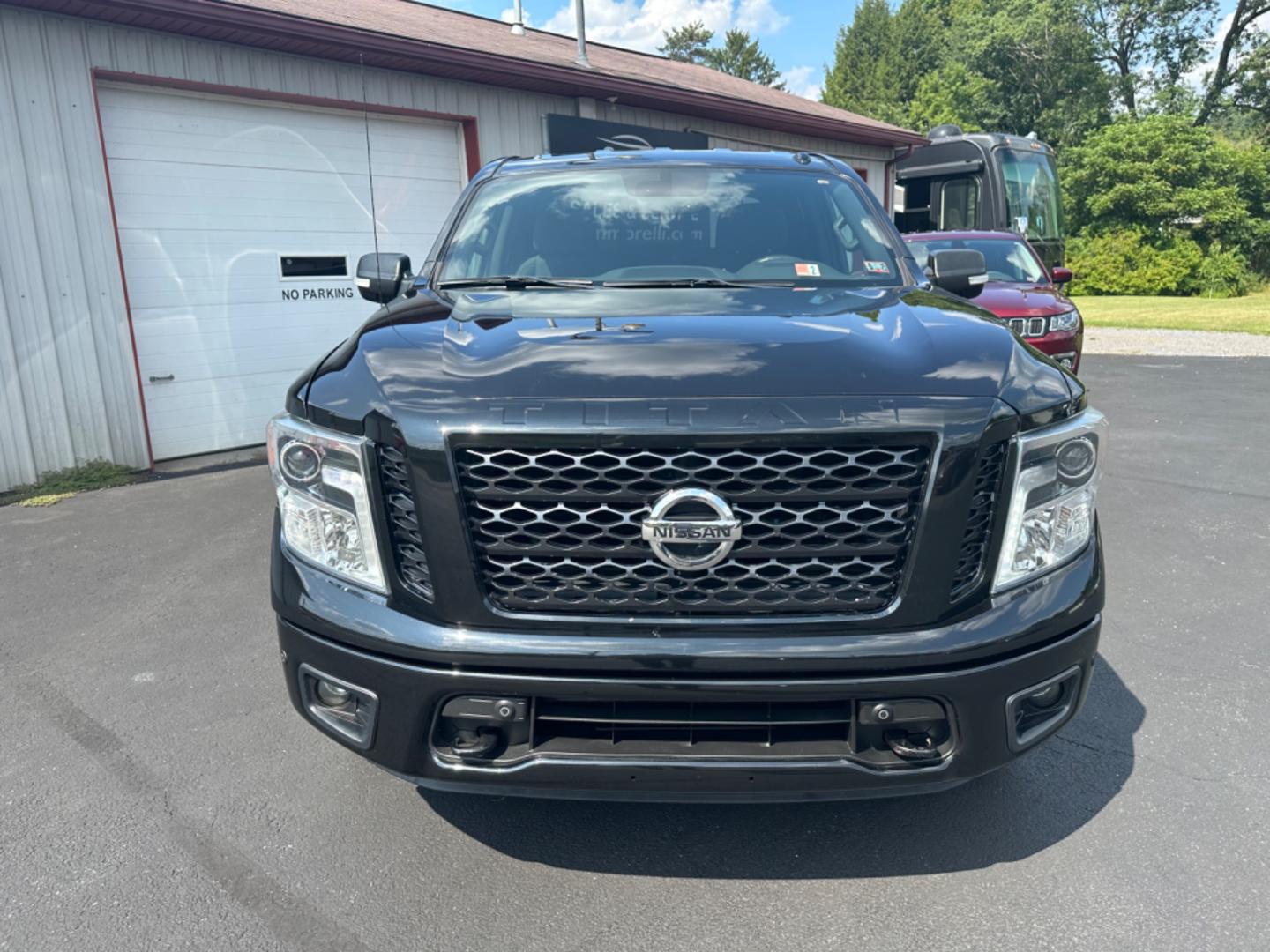 2018 Black Nissan Titan (1N6AA1E53JN) with an 8 engine, automatic transmission, located at 8464 Route 219, Brockway, PA, 15824, (814) 265-1330, 41.226871, -78.780518 - ONE SHARP TRUCK...THIS 2018 Nissan Titan SV crew cab 4wd truck is very well taken care of and well equipped. Midnight edition with blacked out wheels, V8 engine, air condition, pwr seat, running boards, factory hitch and much more. This truck is serviced and under coated. Very nice pre owned truck!! - Photo#18