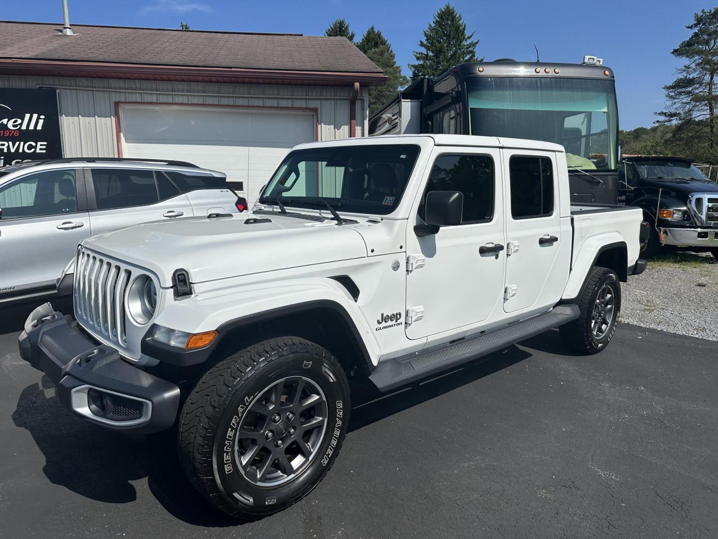 2020 Jeep Gladiator Overland (1C6HJTFG0LL) with an 3.6L V6 DOHC 24V engine, 6M transmission, located at 8464 Route 219, Brockway, PA, 15824, (814) 265-1330, 41.226871, -78.780518 - Good looking fresh trade in and in very nice shape. 2020 Jeep Gladiator Overland 4wd with matching hard top, leather interior with heated front seats, back up camera with navigation, hitch, and much more. This Jeep has been serviced and priced to sell. Hurry in this one won't last long. - Photo#0