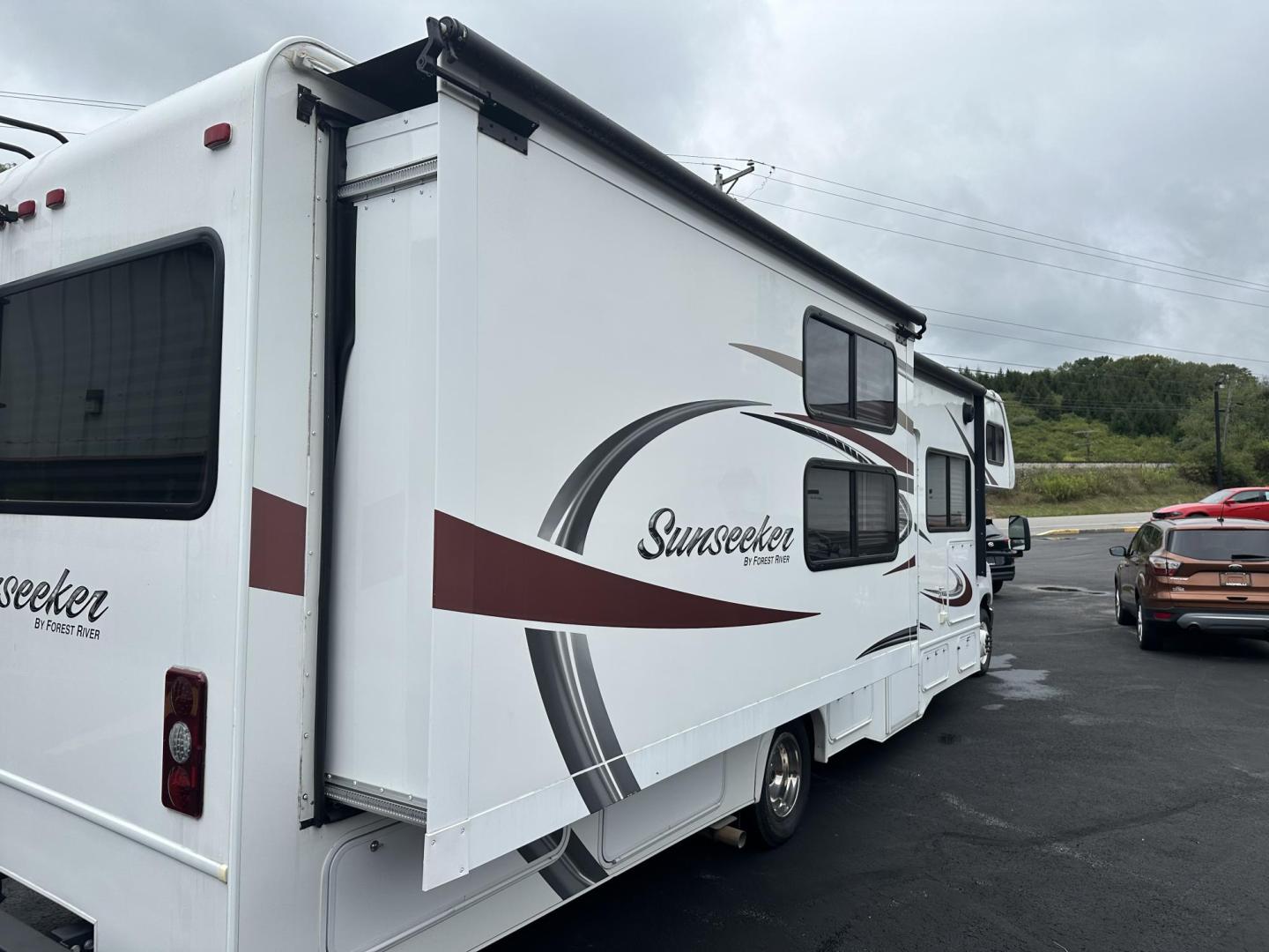 2015 Ford Econoline E450 (1FDXE4FS1FD) with an 6.8L V10 SOHC 20V engine, located at 8464 Route 219, Brockway, PA, 15824, (814) 265-1330, 41.226871, -78.780518 - Not to late to get into a camper for your next vacation..stop in and see this 1-local owner well equipped and very low miles. Very clean and well taken care of. Slide outs. 6.8 gas engine, 32 feet long, queen ed, and lots of extras. Stop in and check out this home on wheels. - Photo#7