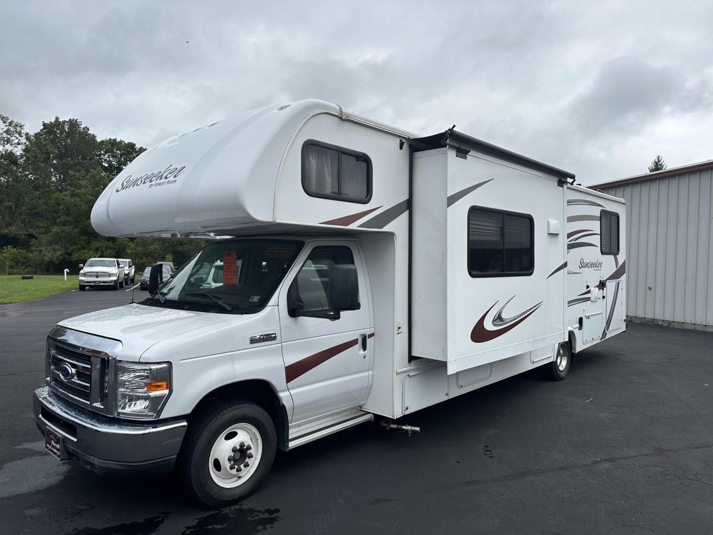 2015 Ford Econoline E450 (1FDXE4FS1FD) with an 6.8L V10 SOHC 20V engine, located at 8464 Route 219, Brockway, PA, 15824, (814) 265-1330, 41.226871, -78.780518 - Not to late to get into a camper for your next vacation..stop in and see this 1-local owner well equipped and very low miles. Very clean and well taken care of. Slide outs. 6.8 gas engine, 32 feet long, queen ed, and lots of extras. Stop in and check out this home on wheels. - Photo#0