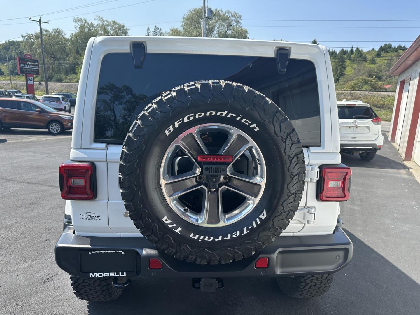 2018 White Jeep Wrangler Unlimited Sahara (1C4HJXEN6JW) with an 2.0L L4 DOHC 16V TURBO engine, 6A transmission, located at 8464 Route 219, Brockway, PA, 15824, (814) 265-1330, 41.226871, -78.780518 - Fresh local trade in very nice shape and well equipped...stop in and see this 2018 Jeep Wrangler Unlimited Sahara with leather interior, power top, lift kit, a/c, power windows and locks, back up camera, and much more. Low miles, serviced, and comes with a warranty. - Photo#10