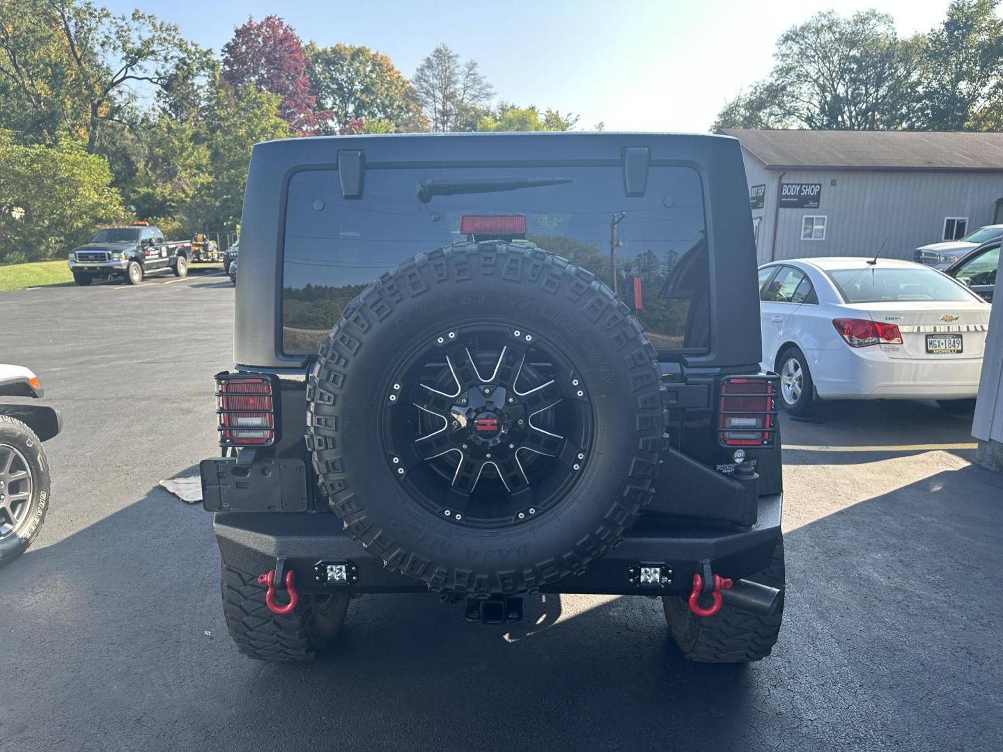 2016 Black Jeep Wrangler Unlimited Sahara 4WD (1C4BJWEGXGL) with an 3.6L V6 DOHC 24V FFV engine, located at 8464 Route 219, Brockway, PA, 15824, (814) 265-1330, 41.226871, -78.780518 - Photo#9