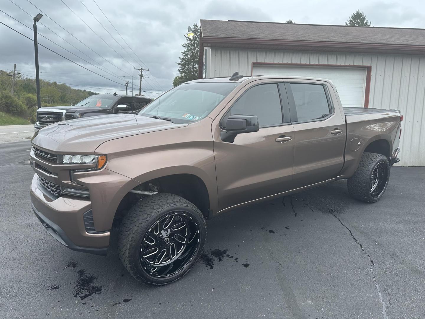 2019 Brown Chevrolet Silverado 1500 RST Crew Cab 4WD (3GCUYEED6KG) with an 5.3L V8 OHV 16V engine, 6A transmission, located at 8464 Route 219, Brockway, PA, 15824, (814) 265-1330, 41.226871, -78.780518 - Good looking 2019 Chevrolet 1500 crew cab RST pkg with V8 engine, air condition, power seat, bed cover, factory hitch, lift and much more. - Photo#0