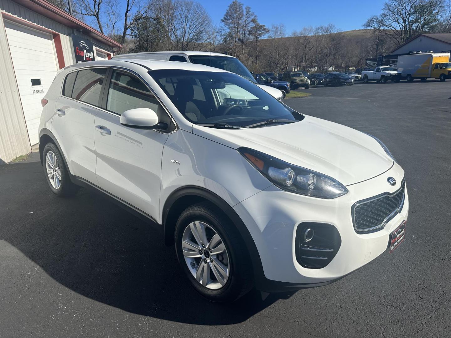 2019 White Kia Sportage LX AWD (KNDPMCAC6K7) with an 2.4L V6 DOHC 24V engine, 6A transmission, located at 8464 Route 219, Brockway, PA, 15824, (814) 265-1330, 41.226871, -78.780518 - A very clean well taken care of 2019 Kia Sportage LX AWD well equipped, and serviced up. This 2019 Kia suv has alloy wheels, air condition, power windows and locks, and much more. - Photo#14