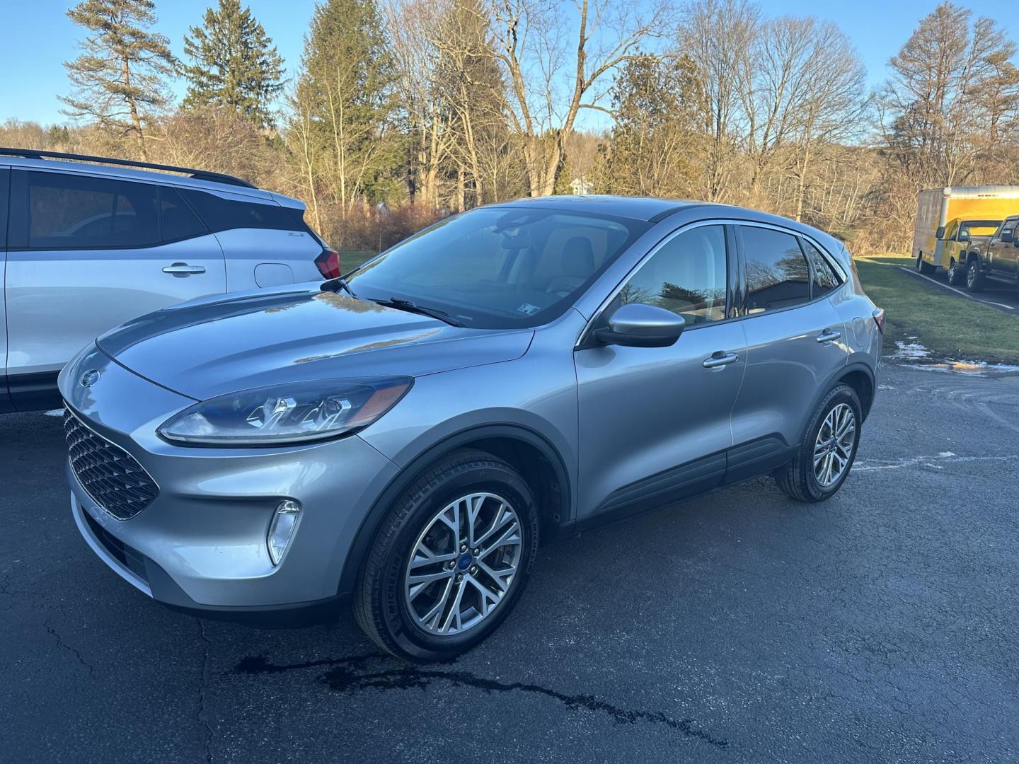 2022 Silver Ford Escape SEL AWD (1FMCU9H61NU) with an 1.5L L3 engine, 6A transmission, located at 8464 Route 219, Brockway, PA, 15824, (814) 265-1330, 41.226871, -78.780518 - Fresh arrival and a very nice one.. stop in and check out this pre owned Ford Escape SEL 4wd with leather interior, power/heated seats, navigation, air condition, factory alloys, power windows and locks, back up camera, and ONLY 24000 miles. This Ford suv is serviced and comes with factory warranty. - Photo#0