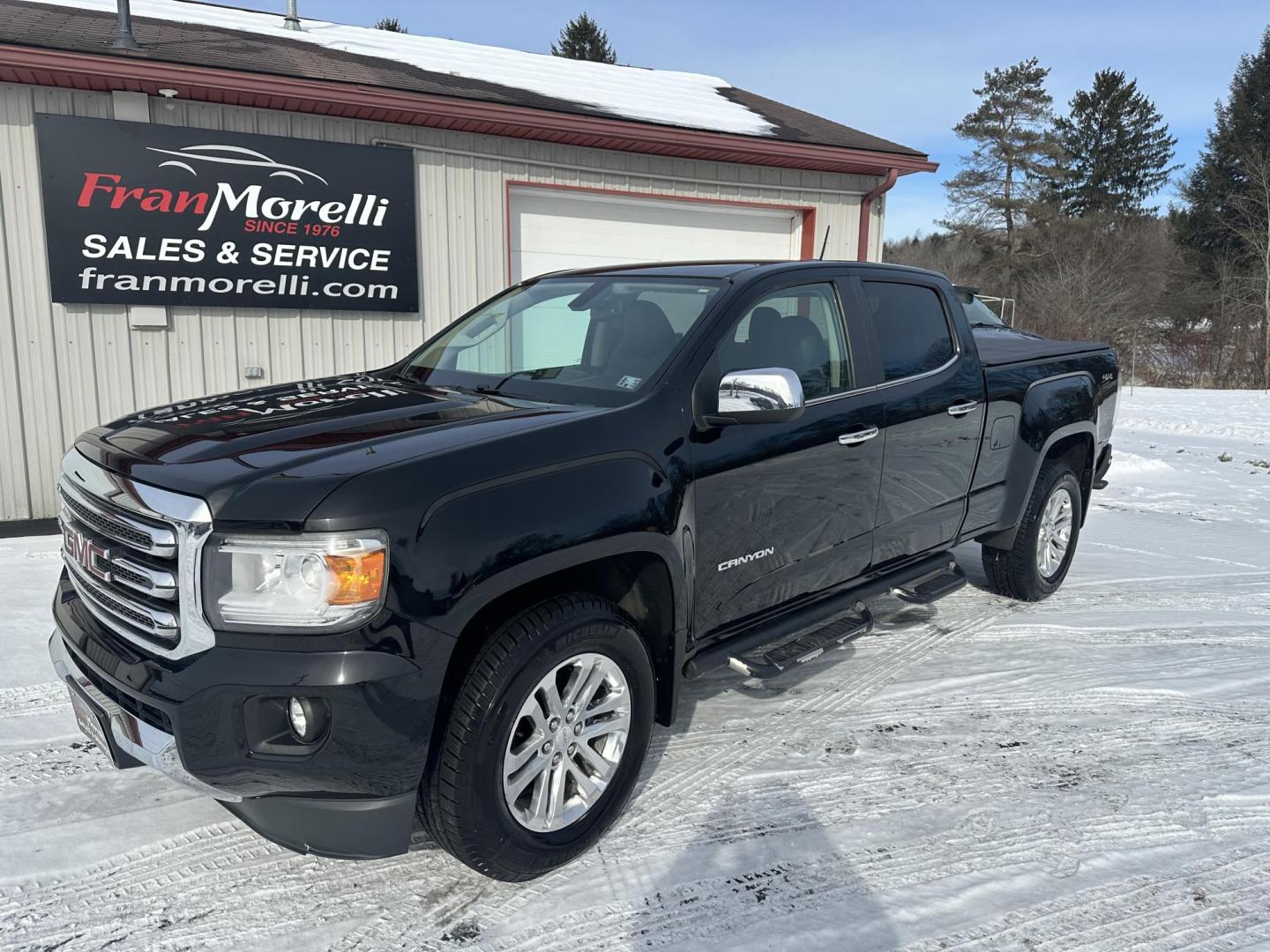 2015 Black GMC Canyon SLT Crew Cab 4WD Short Box (1GTG6CE32F1) with an 3.6L V6 DOHC 24V engine, 6-Speed Automatic transmission, located at 8464 Route 219, Brockway, PA, 15824, (814) 265-1330, 41.226871, -78.780518 - ONE SHARP TRUCK...fresh arrival in this 2015 GMC Canyon Crew SLT 4wd with V6, leather interior, power/heated front seats, air condition, power windows and locks, factory alloys, bed cover, factory hitch and much more. Priced to sell, hurry in before this one is gone. Serviced up with new tires and b - Photo#0