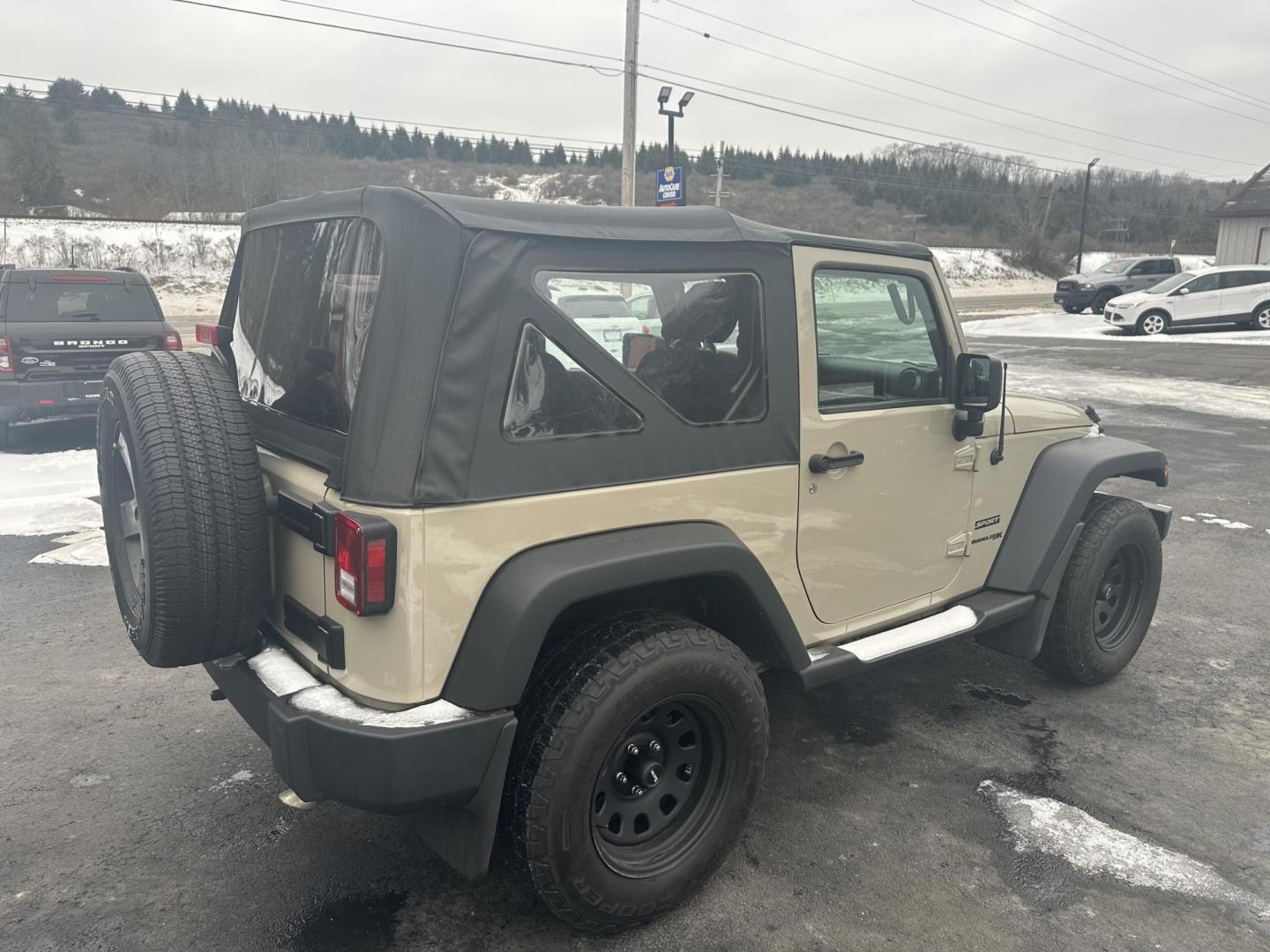 2018 Tan Jeep Wrangler Sport 4WD (1C4AJWAG4JL) with an 3.6L V6 DOHC 24V FFV engine, automatic transmission, located at 8464 Route 219, Brockway, PA, 15824, (814) 265-1330, 41.226871, -78.780518 - Clean, good looking 2018 Jeep Wrangler Sport with V6, air condition, soft top, blacked out wheels, and ONLY 58000 miles. This Jeep is serviced and comes with a warranty. Priced to sell so hurry in before your too late. - Photo#10