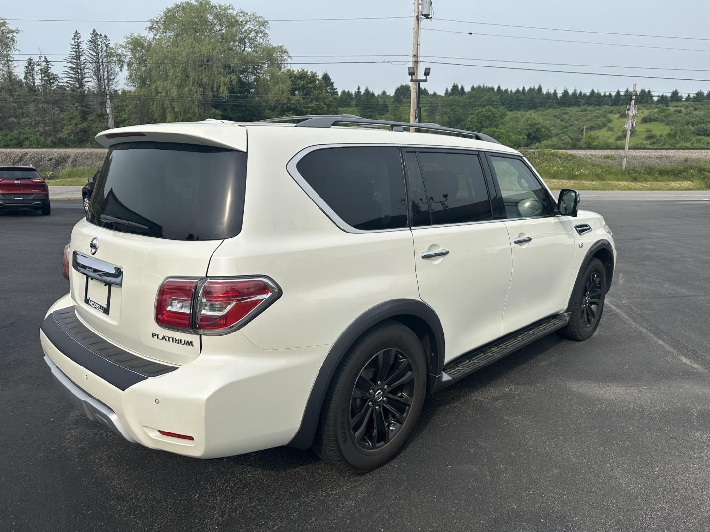 2018 White Nissan Armada SV AWD (JN8AY2NC1J9) with an 5.6L V8 DOHC 32V engine, 7A transmission, located at 8464 Route 219, Brockway, PA, 15824, (814) 265-1330, 41.226871, -78.780518 - Sharp, well taken care of 2018 Nissan Armada Platinum AWD with V8 engine, leather interior, power/heated seats, sunroof, navigation, 3rd row seating with 7-passenger with rear a/c, running boards and much much more. Very clean and priced to sell. Call Darren on this sweet Nissan. - Photo#4
