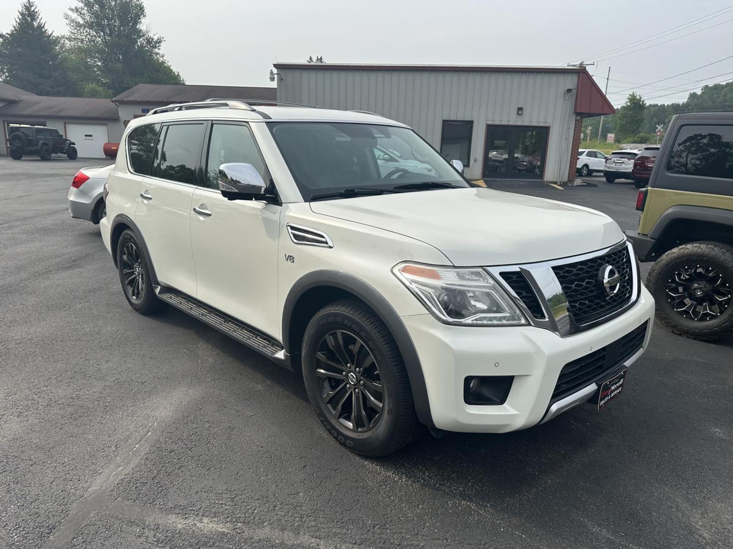 2018 White Nissan Armada SV AWD (JN8AY2NC1J9) with an 5.6L V8 DOHC 32V engine, 7A transmission, located at 8464 Route 219, Brockway, PA, 15824, (814) 265-1330, 41.226871, -78.780518 - Sharp, well taken care of 2018 Nissan Armada Platinum AWD with V8 engine, leather interior, power/heated seats, sunroof, navigation, 3rd row seating with 7-passenger with rear a/c, running boards and much much more. Very clean and priced to sell. Call Darren on this sweet Nissan. - Photo#7