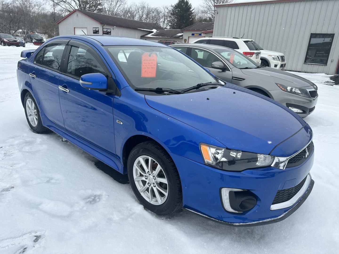 2016 Blue Mitsubishi Lancer ES 5M (JA32U2FU5GU) with an 2.0L L4 SOHC 16V engine, 5M transmission, located at 8464 Route 219, Brockway, PA, 15824, (814) 265-1330, 41.226871, -78.780518 - Locally traded in car that is very nice shape and serviced up. Manual transmission, factory alloy wheels and well equipped. Serviced up and ready to go. - Photo#16