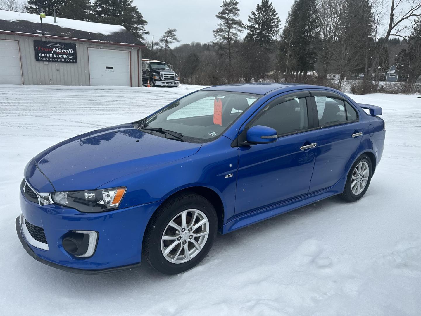 2016 Blue Mitsubishi Lancer ES 5M (JA32U2FU5GU) with an 2.0L L4 SOHC 16V engine, 5M transmission, located at 8464 Route 219, Brockway, PA, 15824, (814) 265-1330, 41.226871, -78.780518 - Locally traded in car that is very nice shape and serviced up. Manual transmission, factory alloy wheels and well equipped. Serviced up and ready to go. - Photo#0