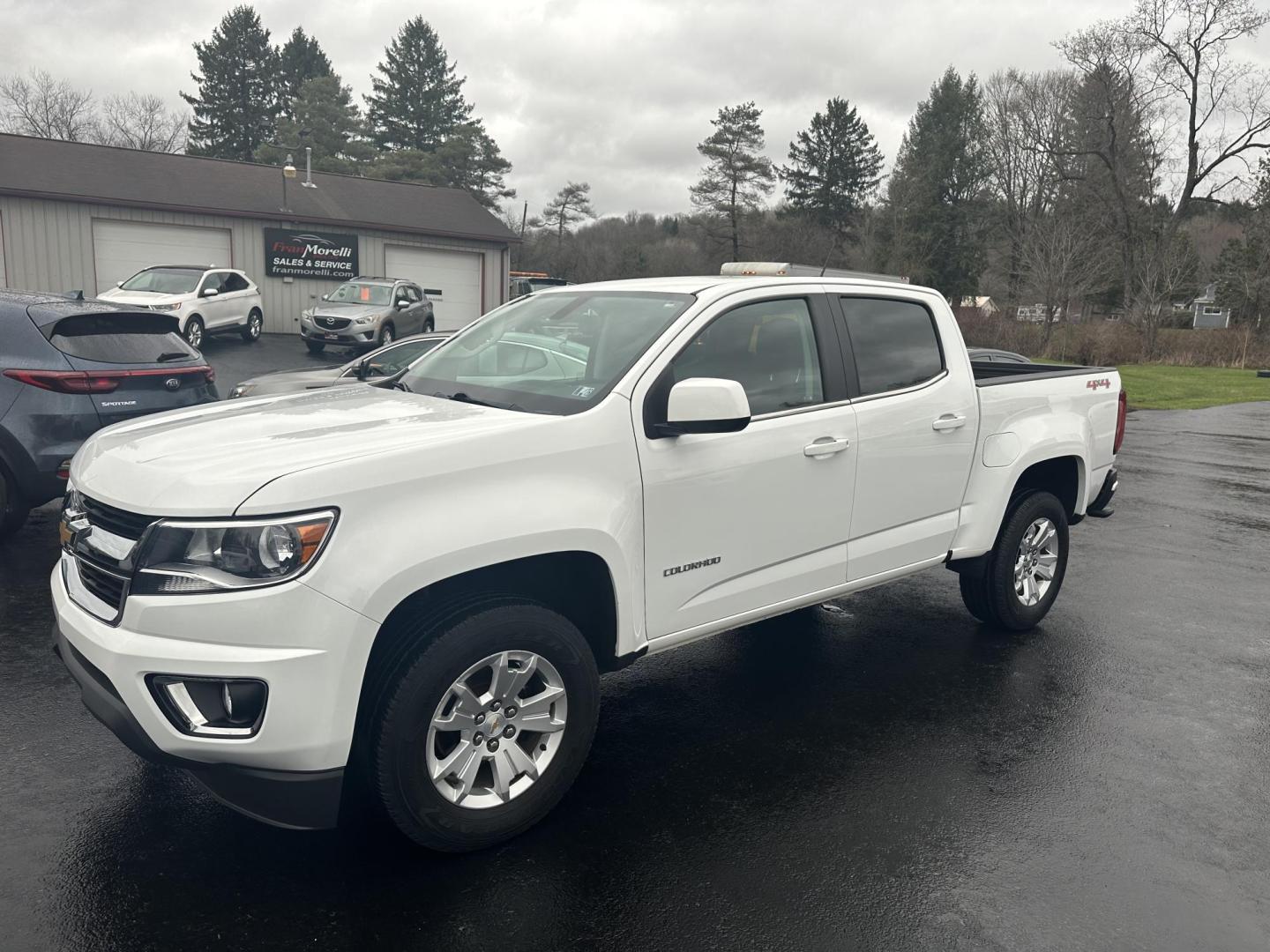 2020 White Chevrolet Colorado LT Crew Cab 4WD Long Box (1GCGTCEN4L1) with an 3.6L V6 DOHC 24V GAS engine, 6A transmission, located at 8464 Route 219, Brockway, PA, 15824, (814) 265-1330, 41.226871, -78.780518 - Sharp, Clean, Well taken care of 2020 Chevy Colorado Crew LT 4wd with V6, air condition, power windows and locks, factory power seat, alloy wheels, spray in bed liner, hitch and ONLY 50,000 miles. This Chevy truck is serviced and comes with a 12 month/12000 mile warranty. - Photo#0