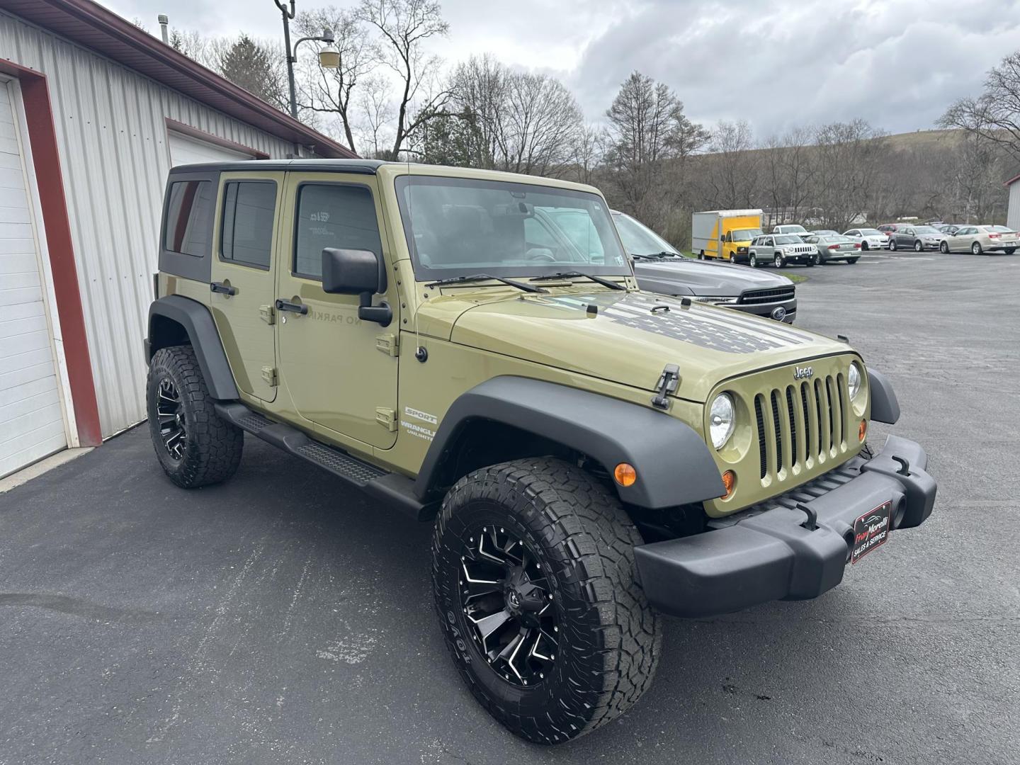 2013 Green Jeep Wrangler Unlimited Sport 4WD (1C4BJWDG5DL) with an 3.6L V6 DOHC 24V FFV engine, located at 8464 Route 219, Brockway, PA, 15824, (814) 265-1330, 41.226871, -78.780518 - Sharp looking 2013 Jeep Wrangler Unlimited Sport with 4wd, auto, air condition, power windows and locks, hard top, lift kit, and much more. This pre owned Jeep Wrangler is well taken care of and priced to sell! - Photo#18