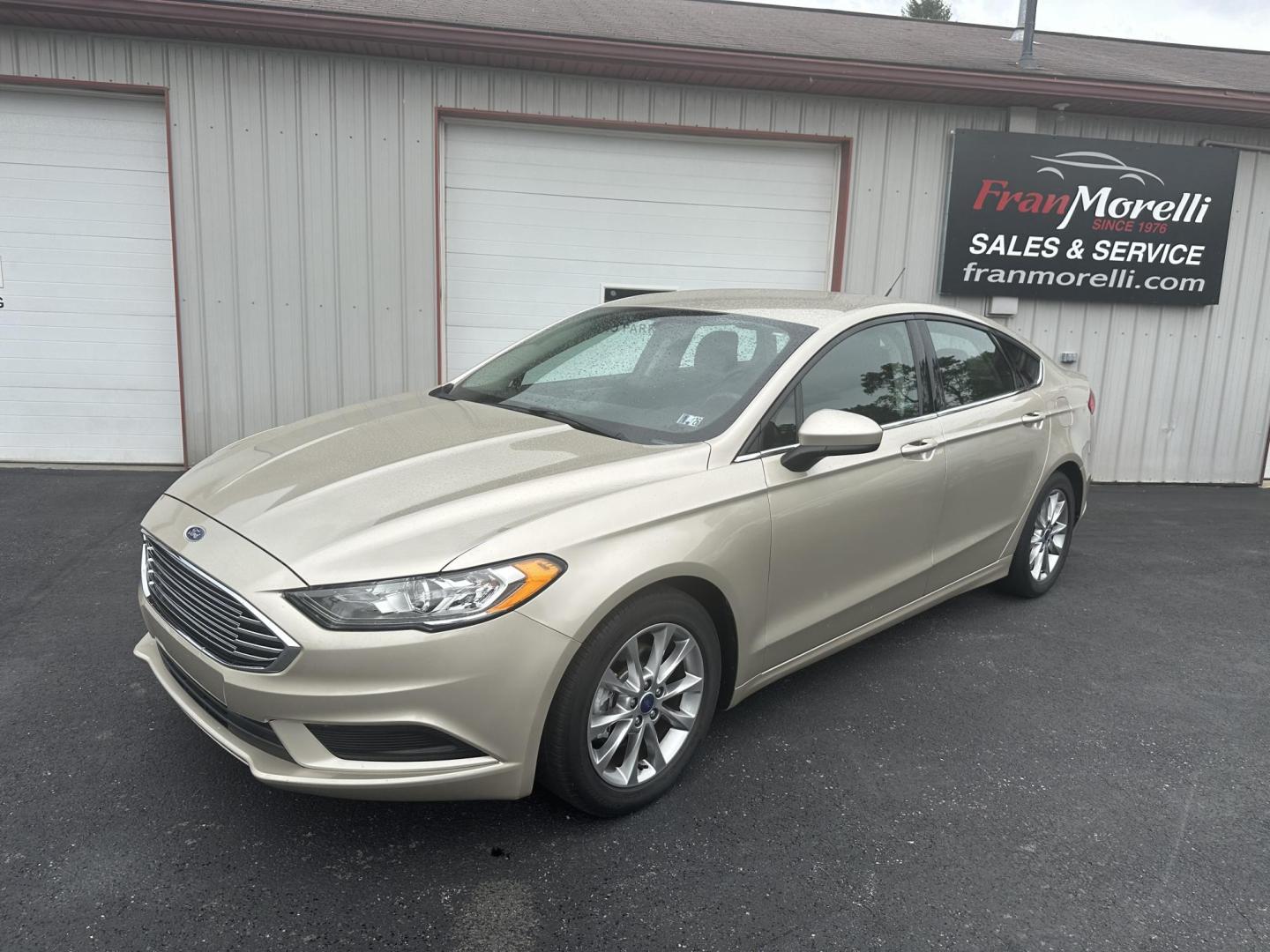 2017 Gold Ford Fusion SE (3FA6P0H78HR) with an 2.5L L4 DOHC 16V engine, 6A transmission, located at 8464 Route 219, Brockway, PA, 15824, (814) 265-1330, 41.226871, -78.780518 - Clean, well taken care of 2017 Ford Fusion SE with only 62,000 miles. This Ford Sedan is well equipped with automatic transmission, air condition, power windows and locks, power seat and factory wheels. Serviced up and ready to go. - Photo#0
